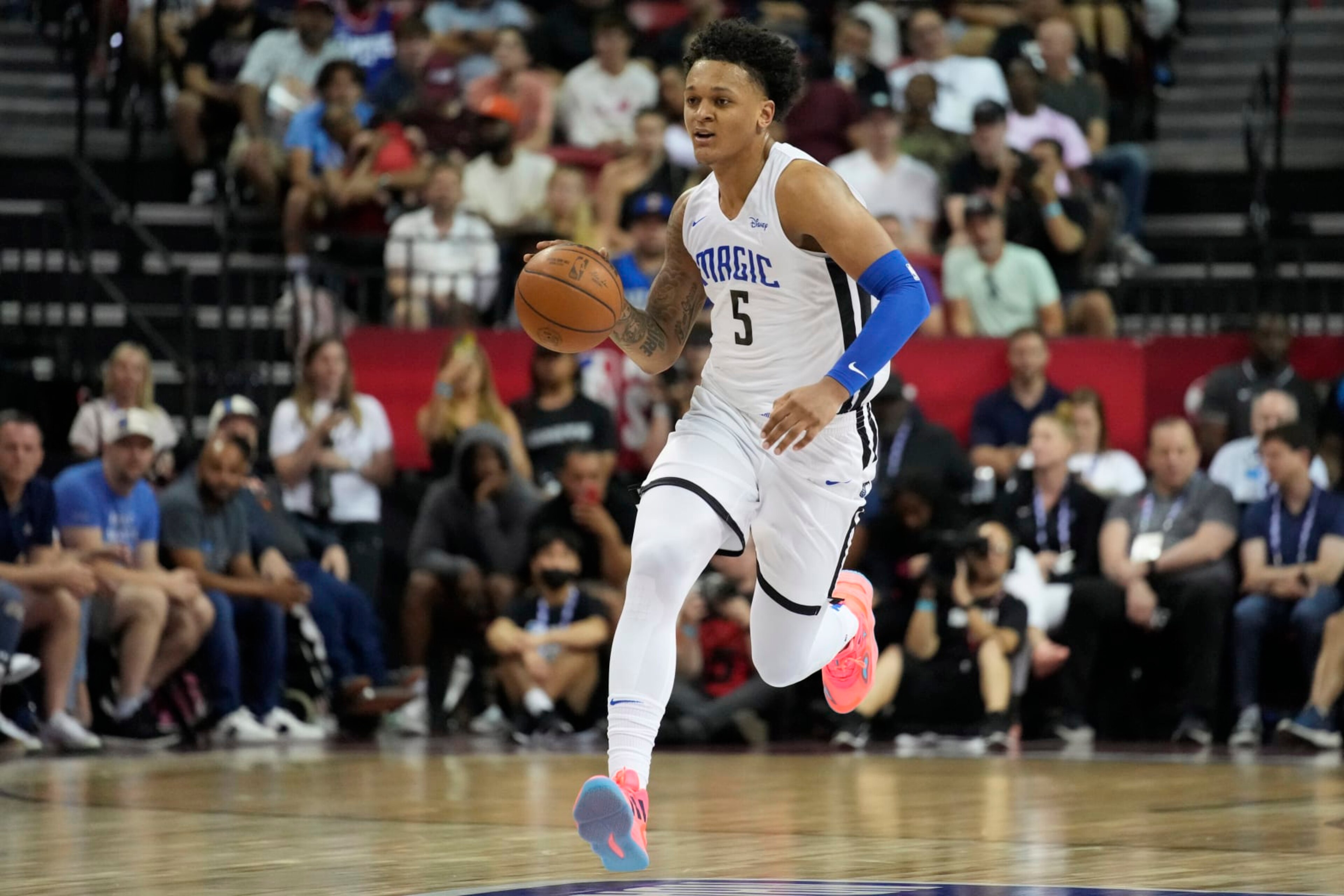 Orlando Magic's Paolo Banchero brings the ball up against the Houston Rockets during the first half an NBA summer league basketball game Thursday, July 7, 2022, in Las Vegas. (AP Photo/John Locher) Orlando Magic's Paolo Banchero brings the ball up against the Houston Rockets during the first half an NBA summer league basketball game Thursday, July 7, 2022, in Las Vegas. (AP Photo/John Locher)