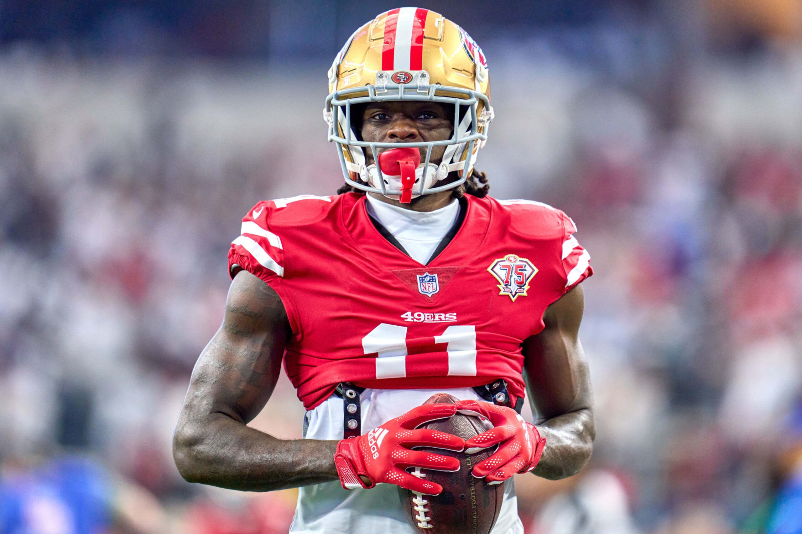 ARLINGTON, TX - JANUARY 16: San Francisco 49ers wide receiver Brandon Aiyuk (11) warms up with the football during the NFC Wild Card game between the San Francisco 49ers and the Dallas Cowboys on January 16, 2022 at AT&T Stadium in Arlington, TX. (Photo by Robin Alam/Icon Sportswire via Getty Images) ARLINGTON, TX - JANUARY 16: San Francisco 49ers wide receiver Brandon Aiyuk (11) warms up with the football during the NFC Wild Card game between the San Francisco 49ers and the Dallas Cowboys on January 16, 2022 at AT&T Stadium in Arlington, TX. (Photo by Robin Alam/Icon Sportswire via Getty Images)