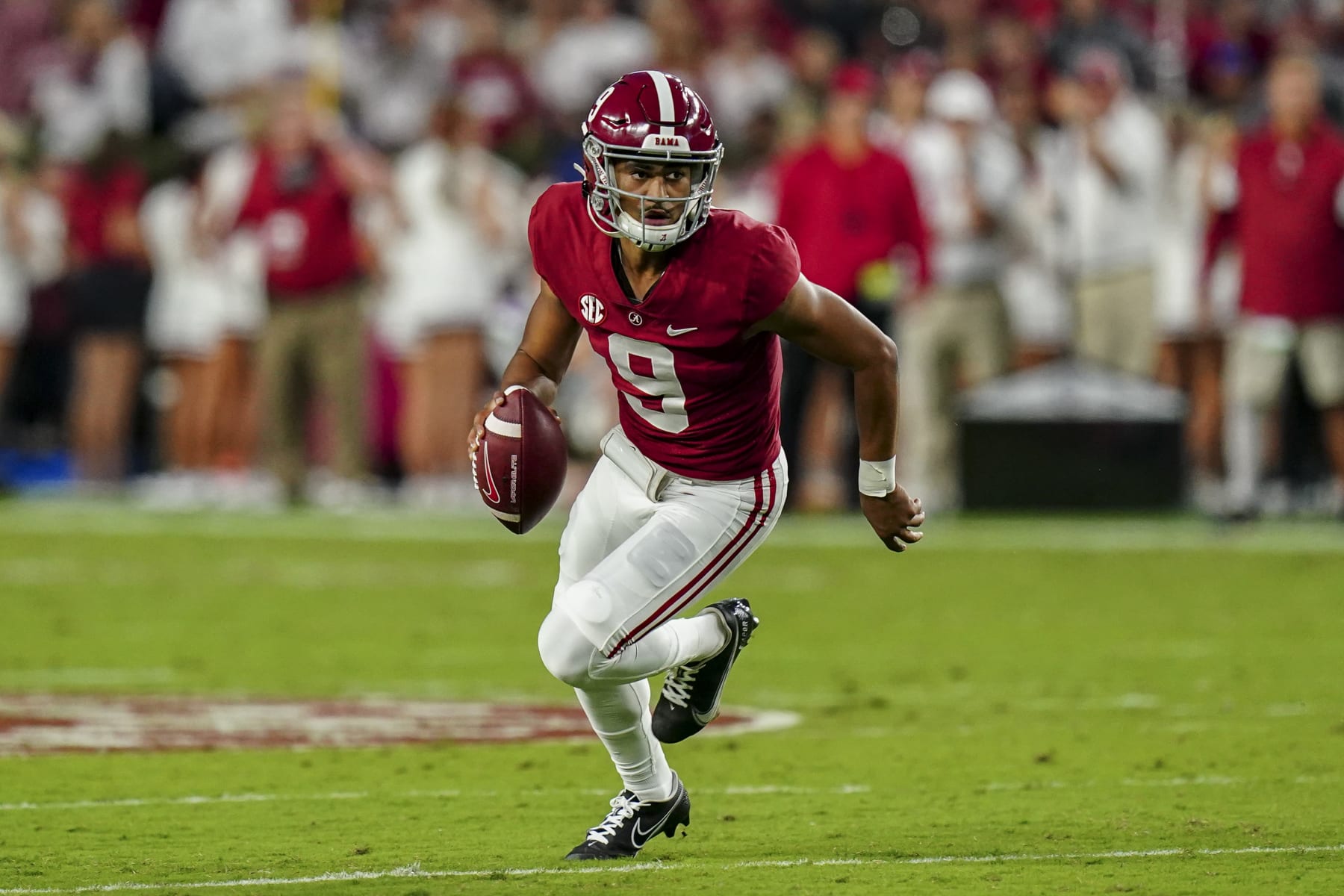 TUSCALOOSA, ALABAMA - OCTOBER 23: Bryce Young #9 of the Alabama Crimson Tide looks to pass against Tennessee Volunteers in the first half at Bryant Denny Stadium on October 23, 2021 in Tuscaloosa, Alabama (Photo by Marvin Gentry/Getty Images )