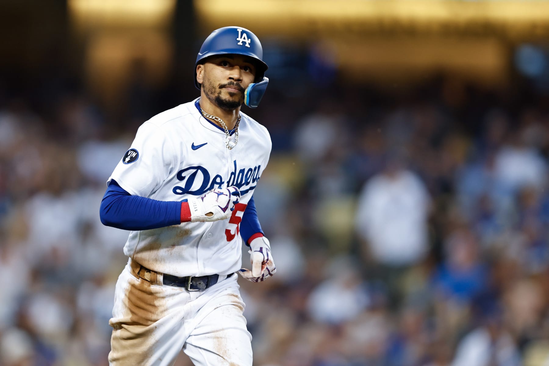 LOS ANGELES, CA - AUGUST 24:   Mookie Betts #50 of the Los Angeles Dodgers flies out in the third inning during the game between the Milwaukee Brewers and the Los Angeles Dodgers at Dodgers Stadium on Wednesday, August 24, 2022 in Los Angeles, California. (Photo by Michael Owens/MLB Photos via Getty Images)