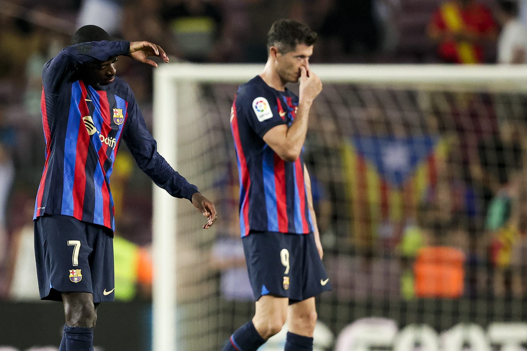 BARCELONA, SPAIN - AUGUST 13: (L-R) Ousmane Dembele of FC Barcelona, Robert Lewandowski of FC Barcelona during the La Liga Santander  match between FC Barcelona v Rayo Vallecano at the Camp Nou on August 13, 2022 in Barcelona Spain (Photo by David S. Bustamante/Soccrates/Getty Images)