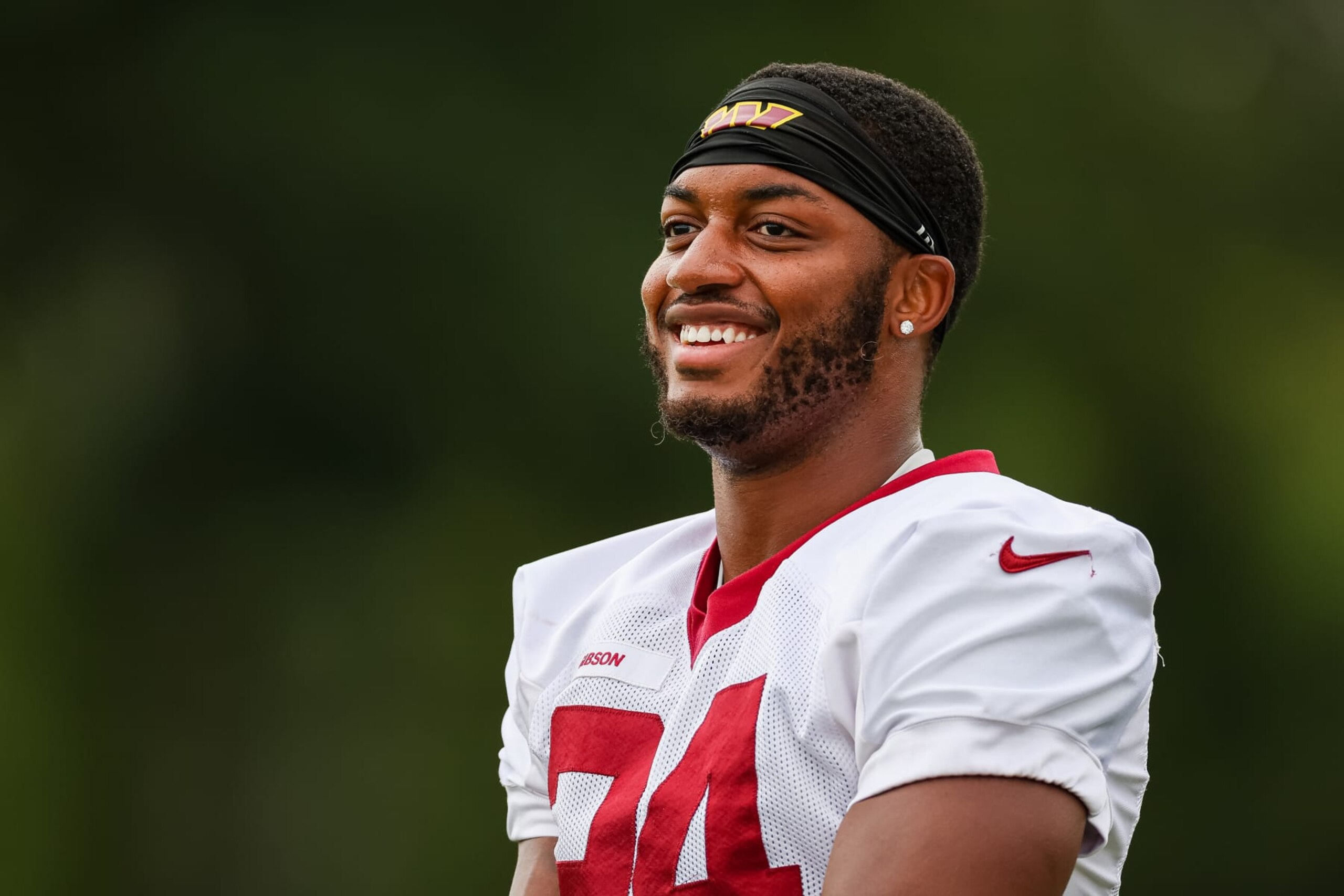 ASHBURN, VA - AUGUST 17: Antonio Gibson #24 of the Washington Commanders participates in a drill during training camp at INOVA Sports Performance Center on August 17, 2022 in Ashburn, Virginia. (Photo by Scott Taetsch/Getty Images)