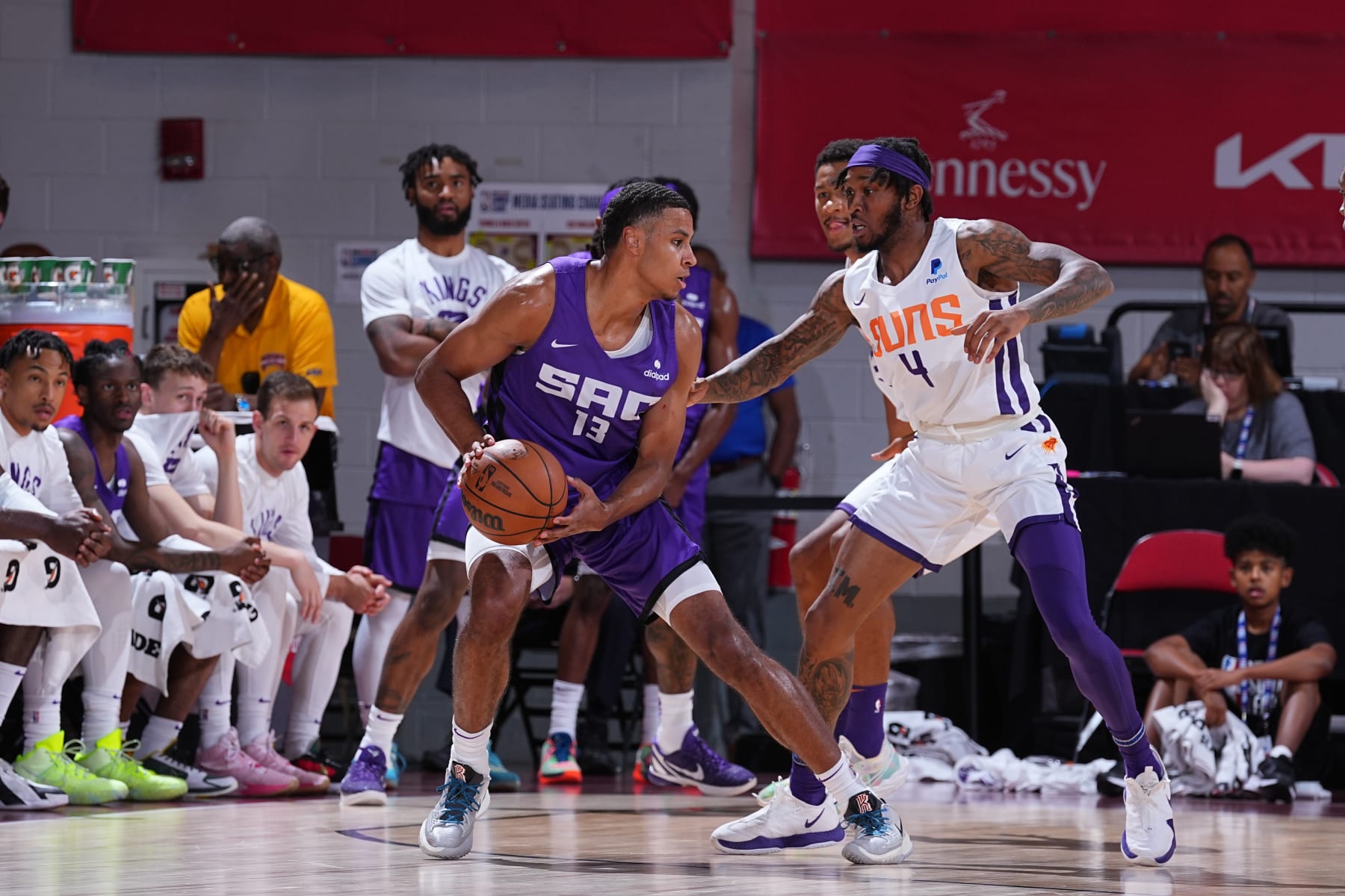LAS VEGAS, NV - JULY 15: Keegan Murray #13 of the Sacramento Kings dribbles the ball against the Phoenix Suns during the 2022 Las Vegas Summer League on July 15, 2022 at the Cox Pavilion in Las Vegas, Nevada NOTE TO USER: User expressly acknowledges and agrees that, by downloading and/or using this Photograph, user is consenting to the terms and conditions of the Getty Images License Agreement. Mandatory Copyright Notice: Copyright 2022 NBAE (Photo by Bart Young/NBAE via Getty Images)