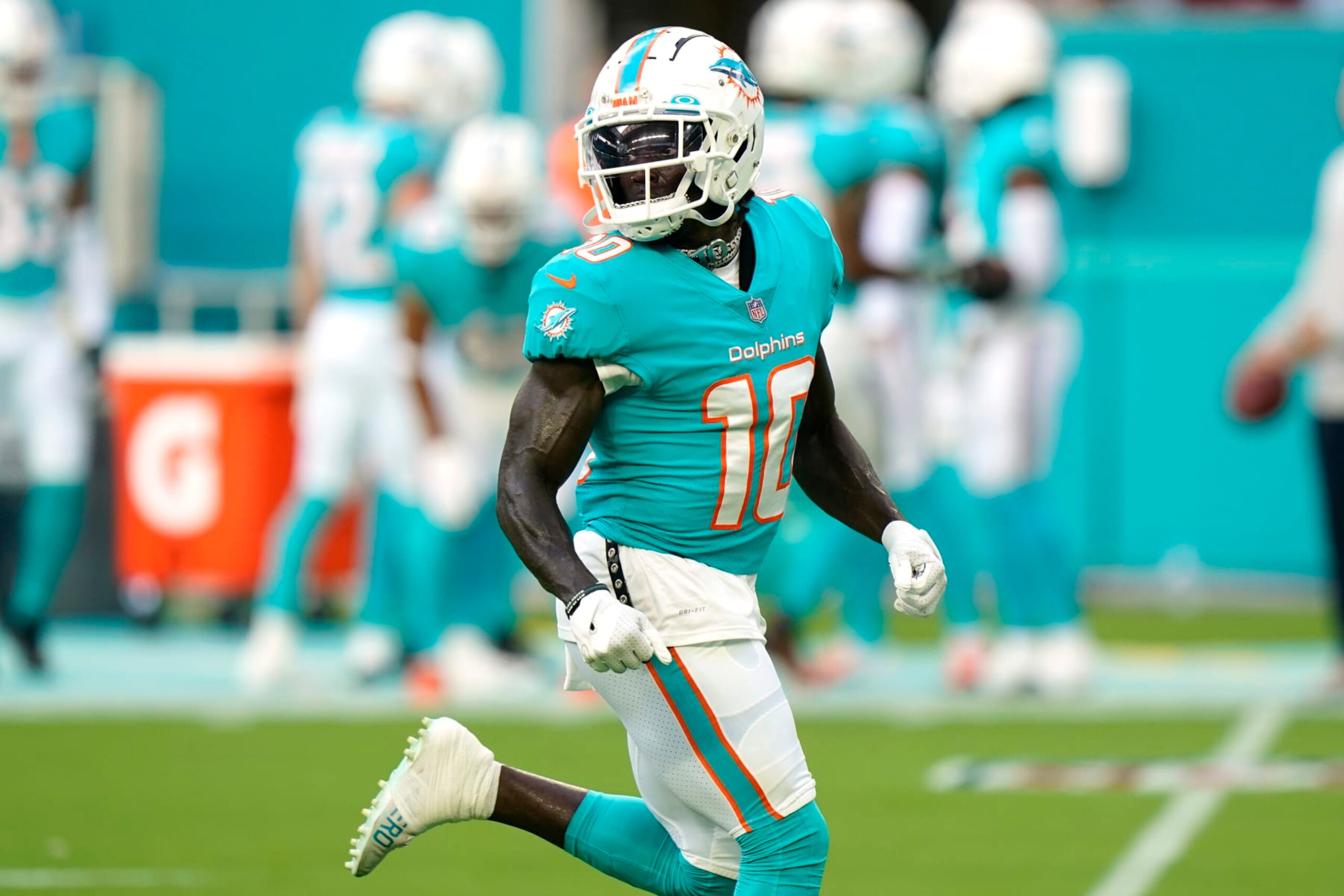 Miami Dolphins wide receiver Tyreek Hill (10) runs before a NFL preseason football game against the Las Vegas Raiders, Saturday, August 20, 2022, in Miami Gardens, Fla. (AP Photo/Wilfredo Lee)