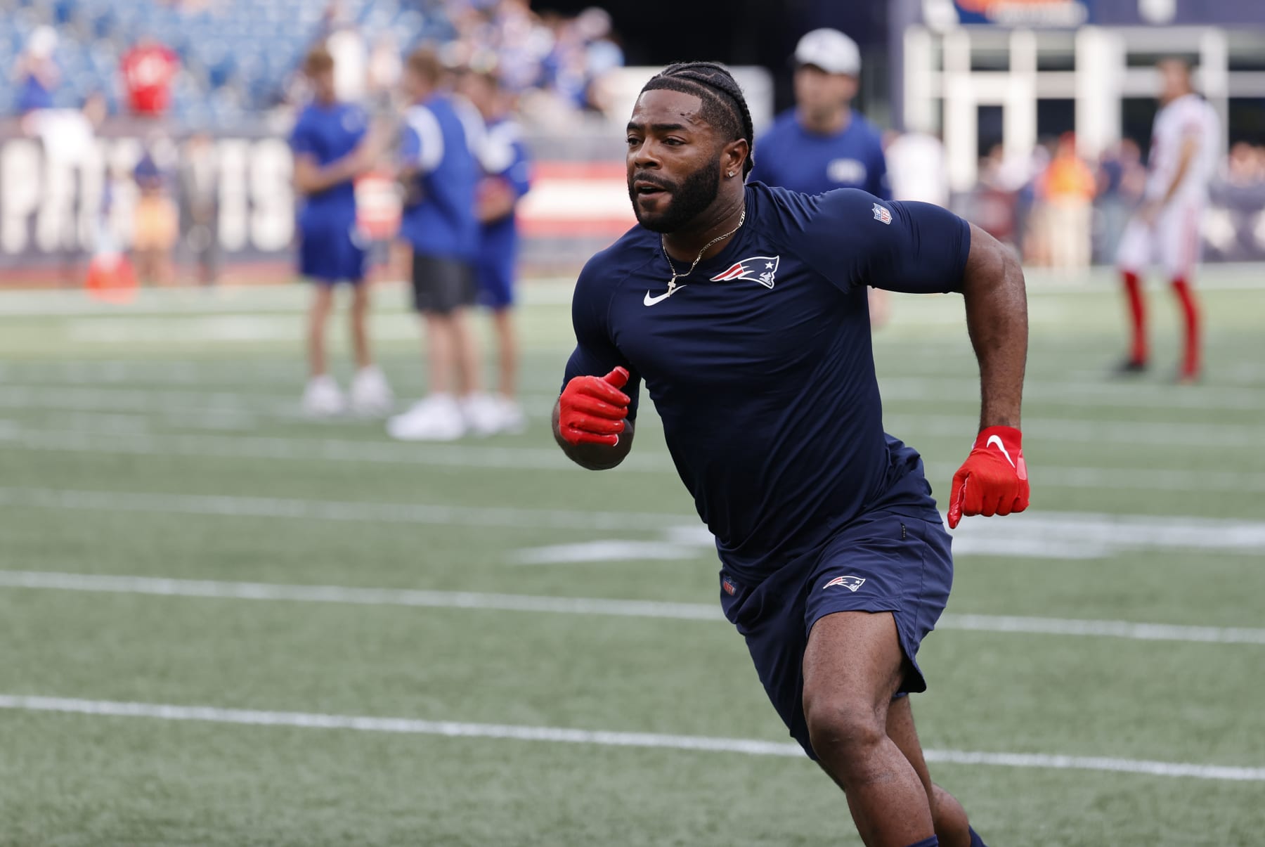 FOXBOROUGH, MA - AUGUST 11: New England Patriots cornerback Malcom Butler (4) in warm up before an NFL preseason game between the New England Patriots and the New York Giants on August 11, 2022, at Gillette Stadium in Foxborough, Massachusetts. (Photo by Fred Kfoury III/Icon Sportswire via Getty Images)