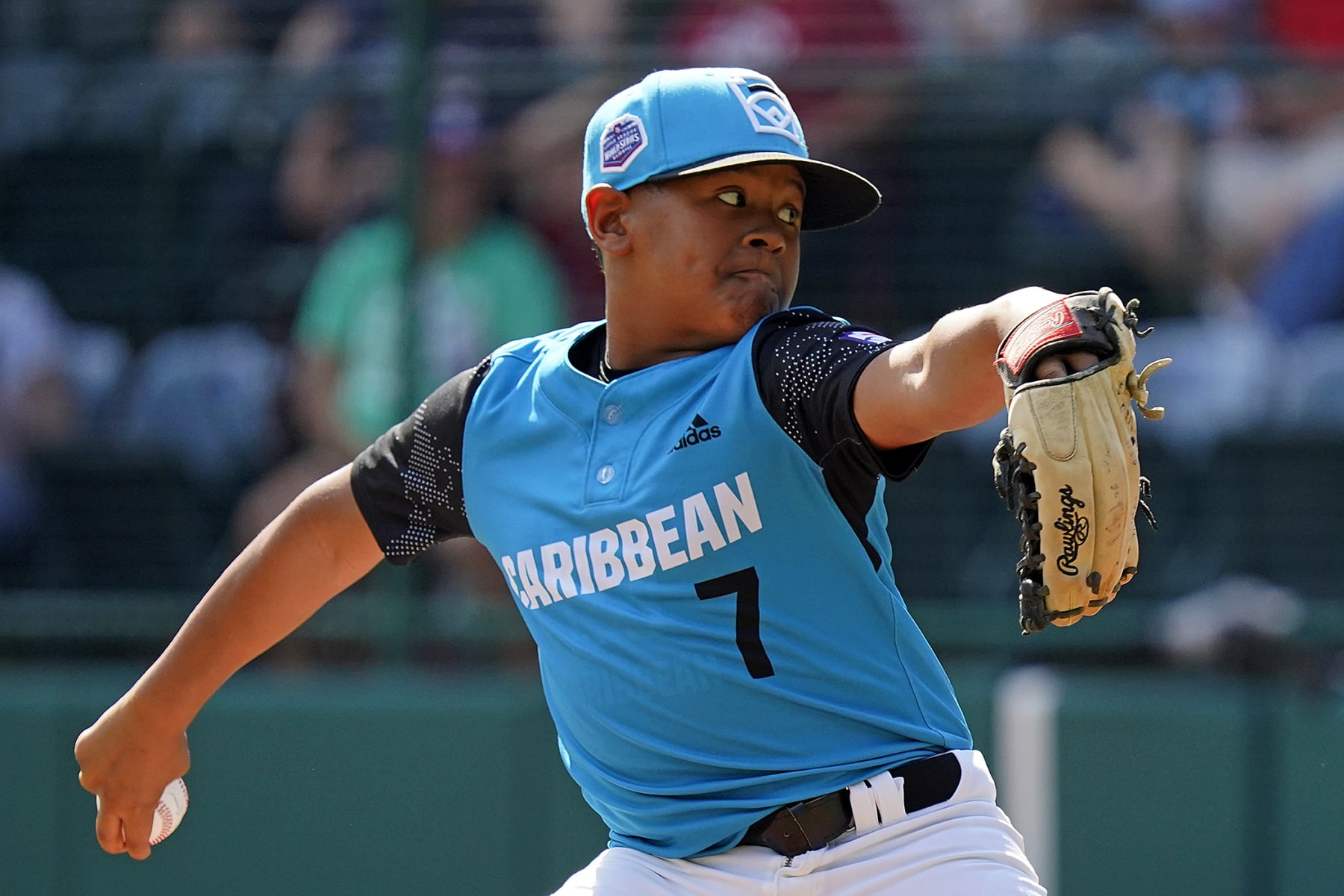 Curacao's Jay-Dlynn Wiel delivers during the third inning of a baseball game against Mexico, at the Little League World Series in South Williamsport, Pa., Thursday, Aug. 25, 2022. (AP Photo/Gene J. Puskar)