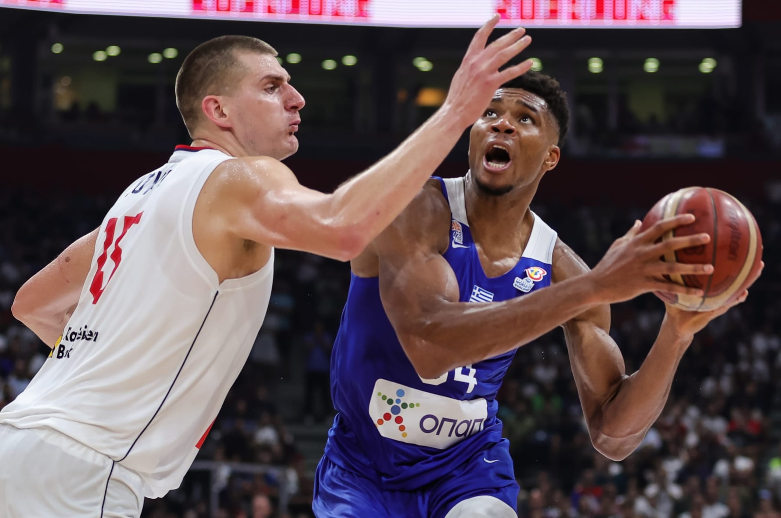 BELGRADE, SERBIA - AUGUST 25: Giannis Antetokounmpo (R) of Greece in action against Nikola Jokic (L) of Serbia during the FIBA Basketball World Cup 2023 Qualifier game between Serbia and Greece at Stark Arena on August 25, 2022 in Belgrade, Serbia. (Photo by Srdjan Stevanovic/Getty Images) BELGRADE, SERBIA - AUGUST 25: Giannis Antetokounmpo (R) of Greece in action against Nikola Jokic (L) of Serbia during the FIBA Basketball World Cup 2023 Qualifier game between Serbia and Greece at Stark Arena on August 25, 2022 in Belgrade, Serbia. (Photo by Srdjan Stevanovic/Getty Images)