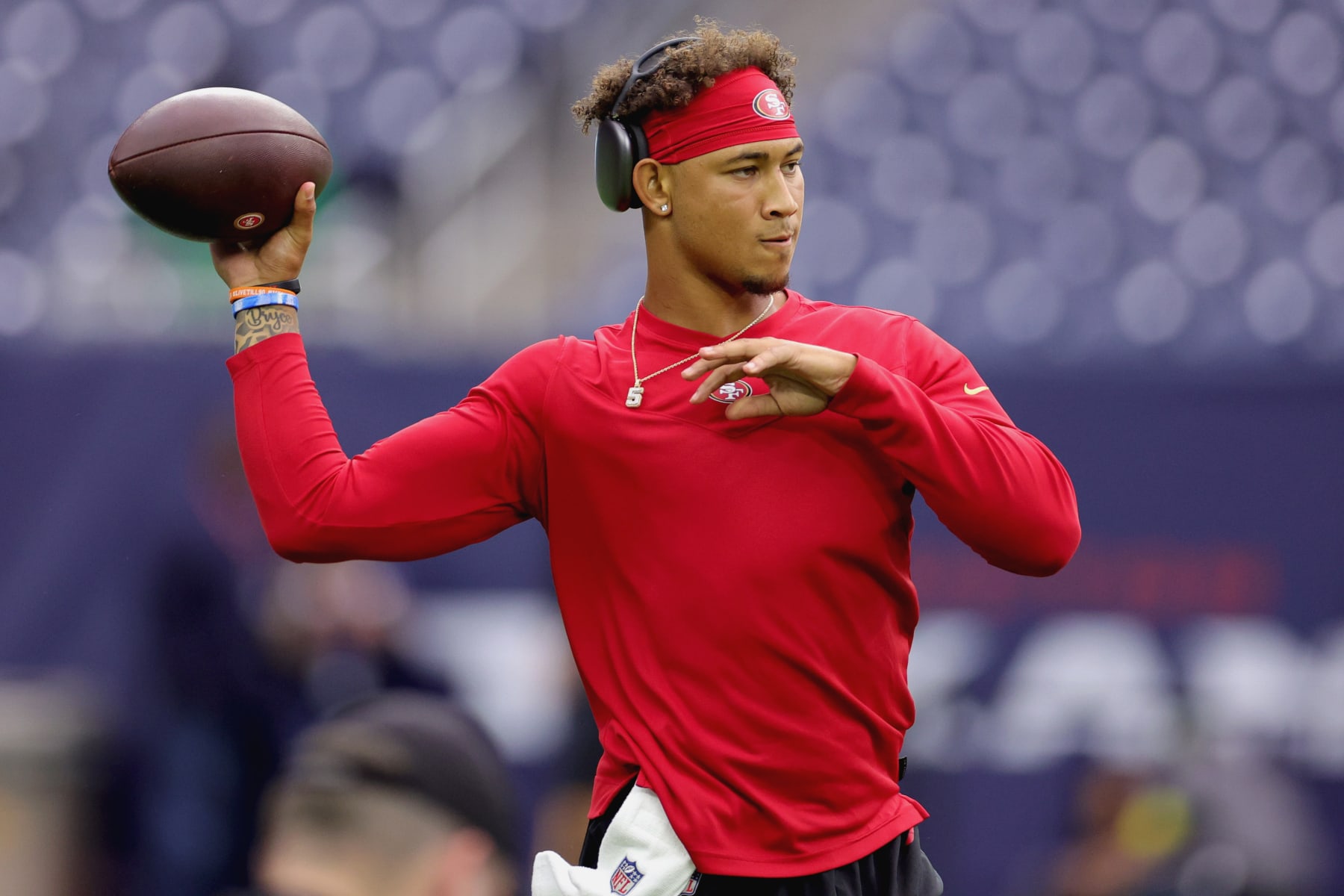 HOUSTON, TEXAS - AUGUST 25: Trey Lance #5 of the San Francisco 49ers warms up prior to facing the Houston Texans during a preseason game at NRG Stadium on August 25, 2022 in Houston, Texas. (Photo by Carmen Mandato/Getty Images)