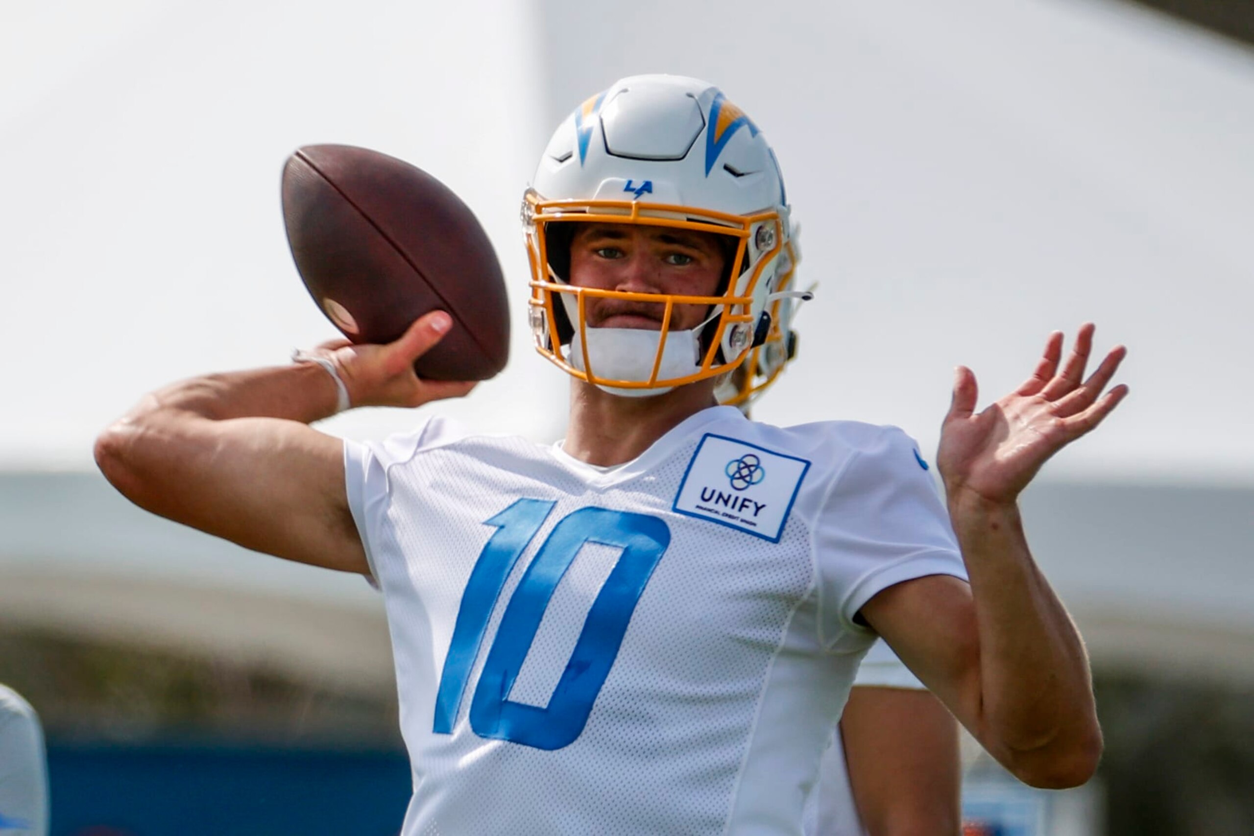 Los Angeles Chargers quarterback Justin Herbert (10) throws a pass during the NFL football team's training camp, Wednesday, July 27, 2022, in Costa Mesa, Calif. (AP Photo/Ringo H.W. Chiu)