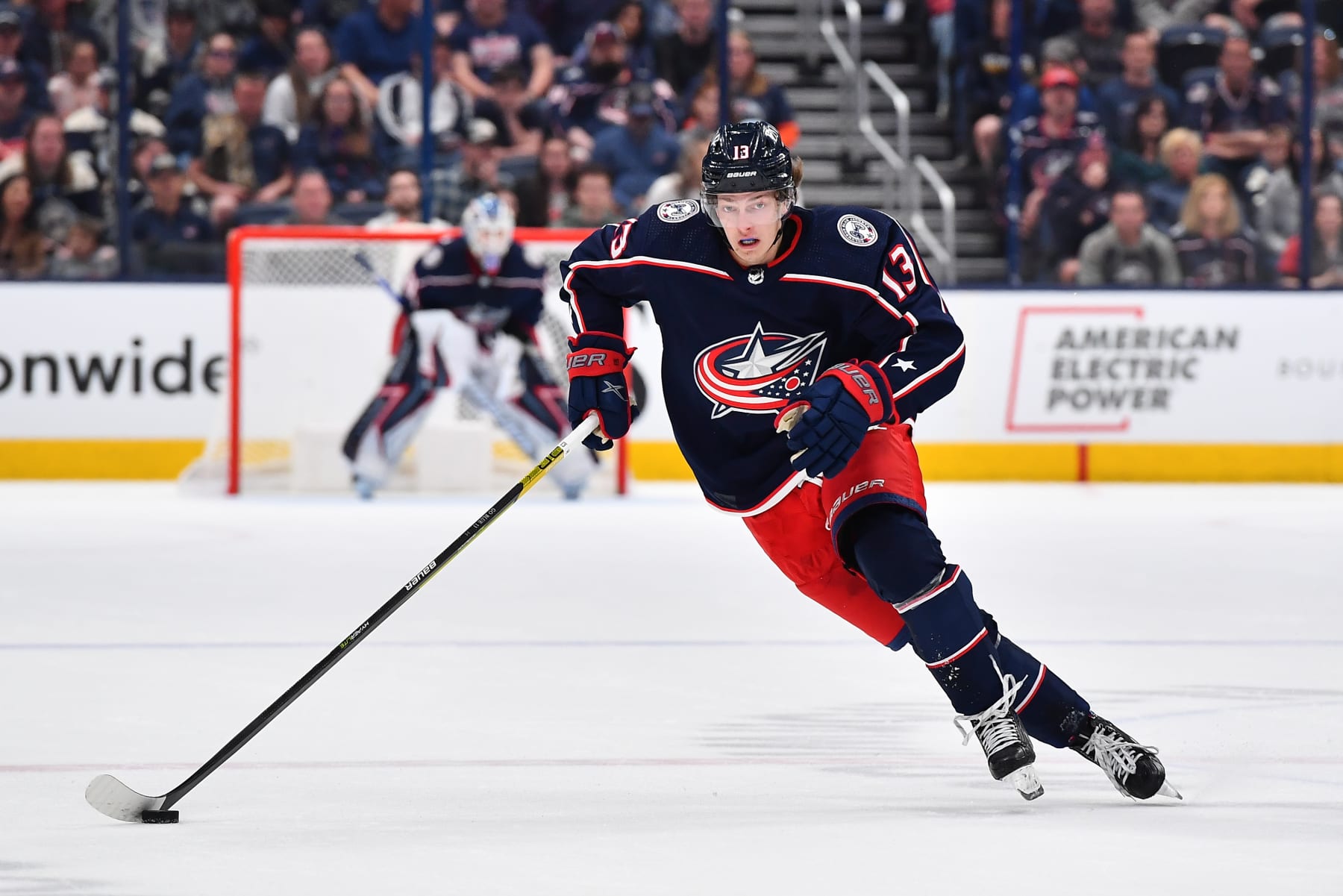 COLUMBUS, OH - APRIL 24: Kent Johnson #13 of the Columbus Blue Jackets skates with the puck during the first period of a game against the Edmonton Oilers at Nationwide Arena on April 24, 2022 in Columbus, Ohio.  (Photo by Ben Jackson/NHLI via Getty Images)
