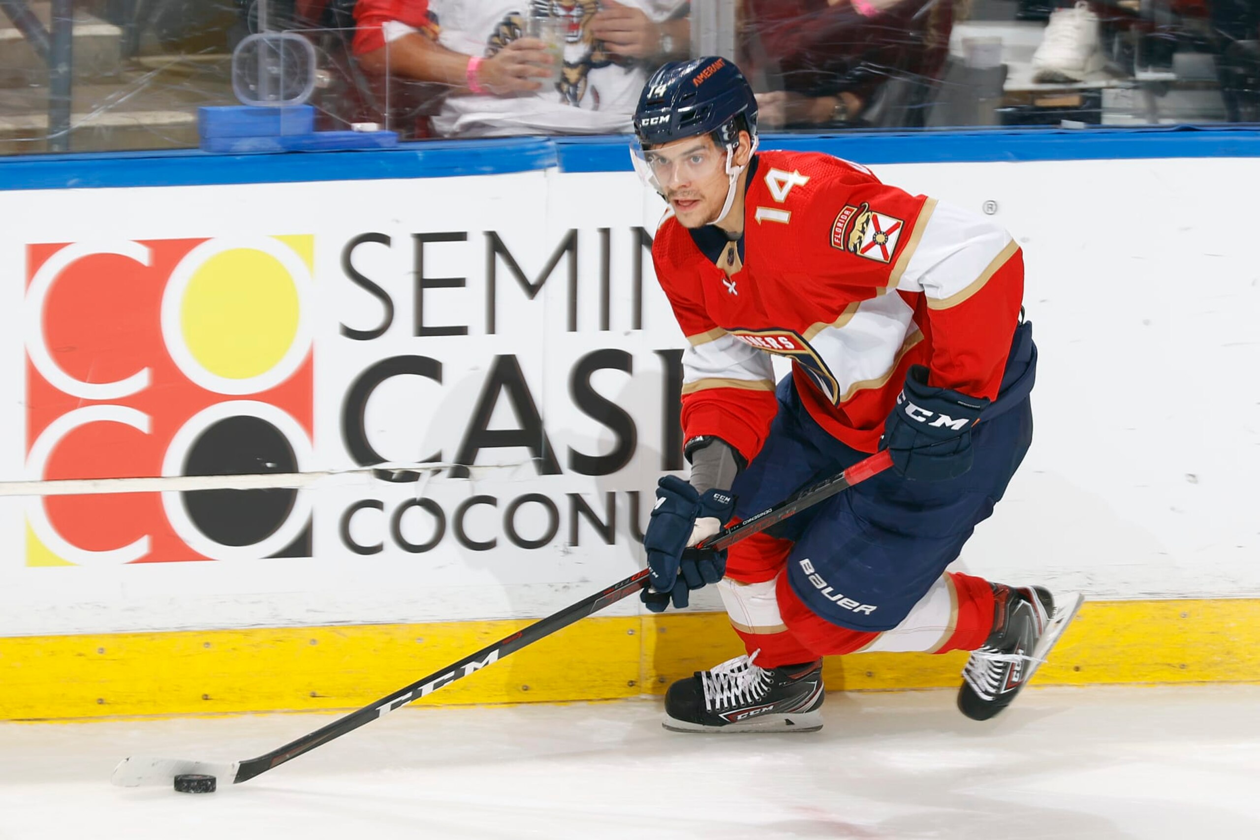 SUNRISE, FL - DECEMBER 16: Grigori Denisenko #14 of the Florida Panthers skates with the puck against the Los Angeles Kings during second period action at the FLA Live Arena on December 16, 2021 in Sunrise, Florida. (Photo by Joel Auerbach/Getty Images)