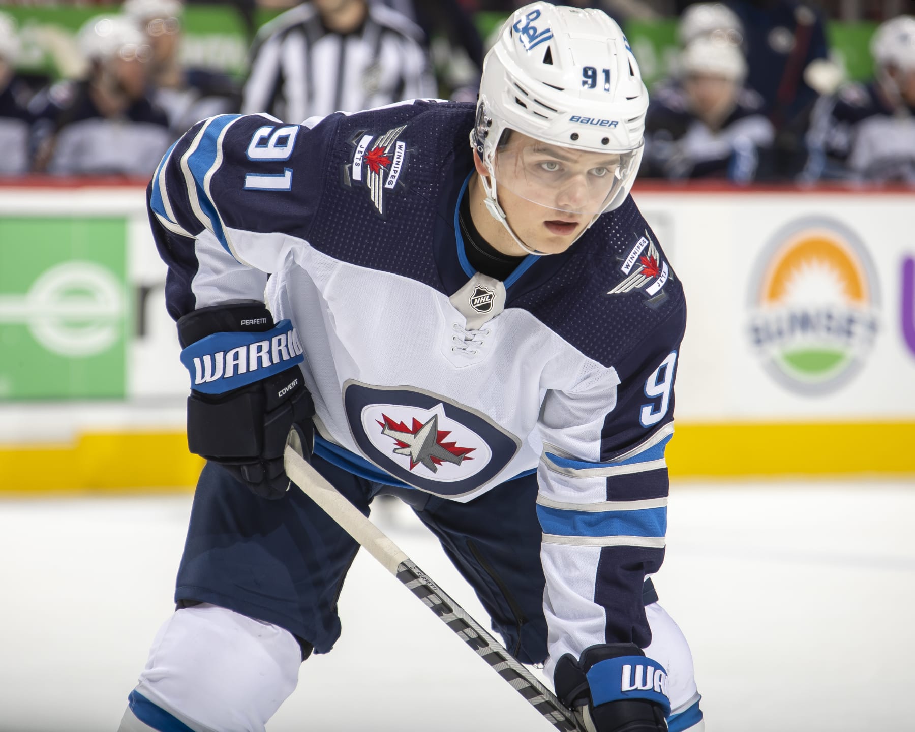 DETROIT, MI - JANUARY 13: Cole Perfetti #91 of the Winnipeg Jets gets set for the face-off against the Detroit Red Wings during the second period of an NHL game at Little Caesars Arena on January 13, 2021 in Detroit, Michigan. Winnipeg defeated Detroit 3-0. (Photo by Dave Reginek/NHLI via Getty Images)