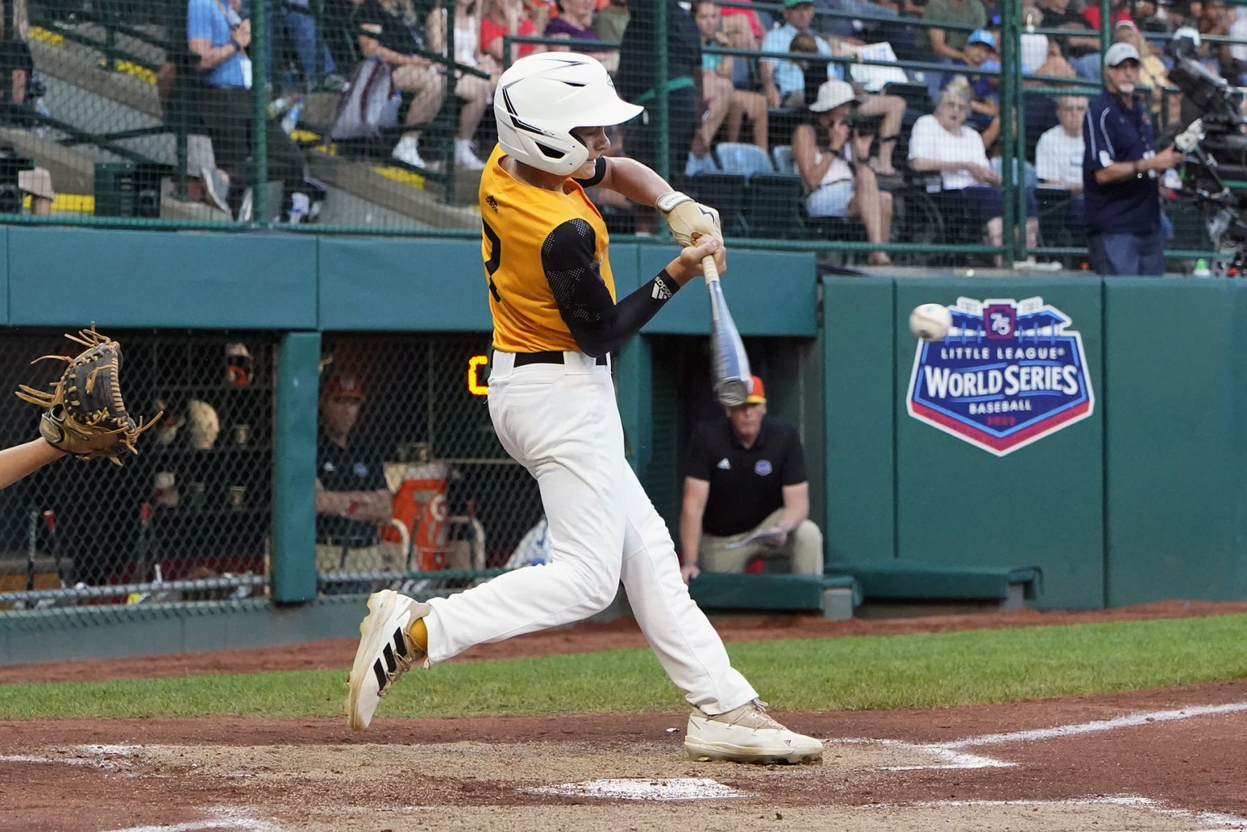 Nolensville, Tenn.'s Josiah Porter follows through on a grand slam during the second inning of a baseball game against Pearland, Texas, at the Little League World Series in South Williamsport, Pa., Thursday, Aug. 25, 2022. (AP Photo/Gene J. Puskar)