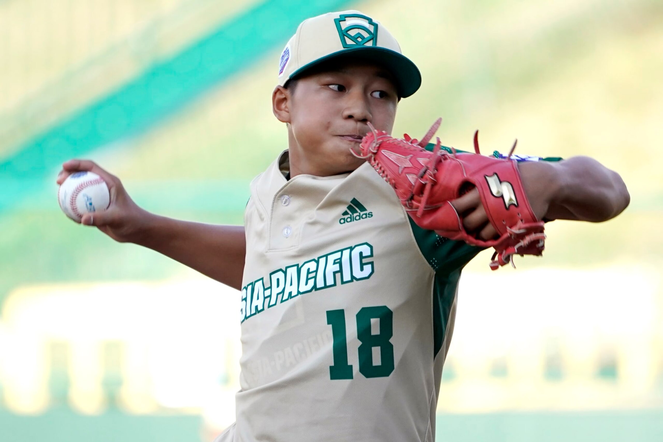 Taiwan's Liao Yuan-Shu delivers a pitch against Panama during the first inning of a baseball game at the Little League World Series tournament in South Williamsport, Pa., Monday, Aug. 22, 2022. (AP Photo/Tom E. Puskar)