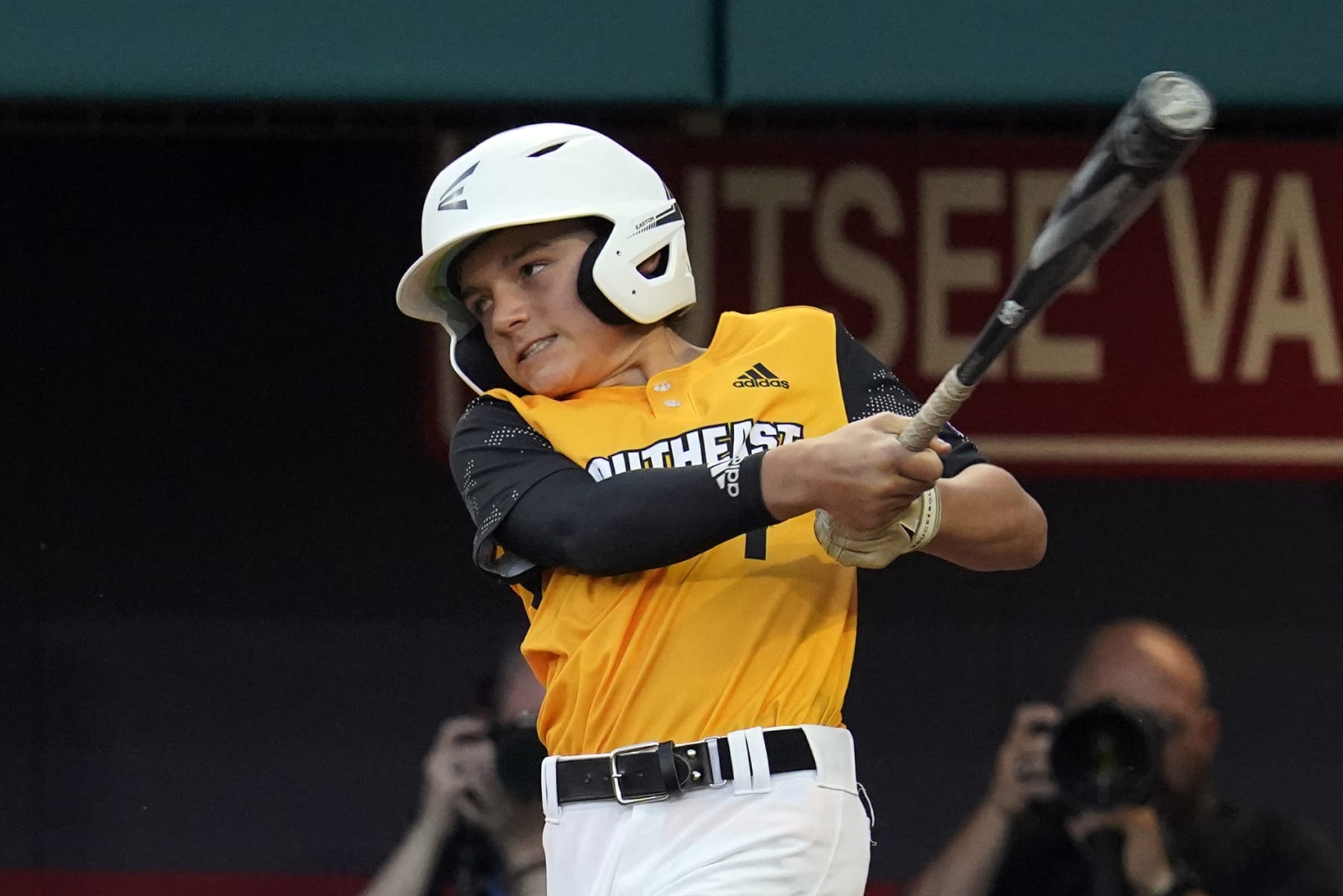 Nolensville, Tenn.'s Josiah Porter follows through on a grand slam during the second inning of a baseball game against Pearland, Texas, at the Little League World Series in South Williamsport, Pa., Thursday, Aug. 25, 2022. (AP Photo/Gene J. Puskar) Nolensville, Tenn.'s Josiah Porter follows through on a grand slam during the second inning of a baseball game against Pearland, Texas, at the Little League World Series in South Williamsport, Pa., Thursday, Aug. 25, 2022. (AP Photo/Gene J. Puskar)