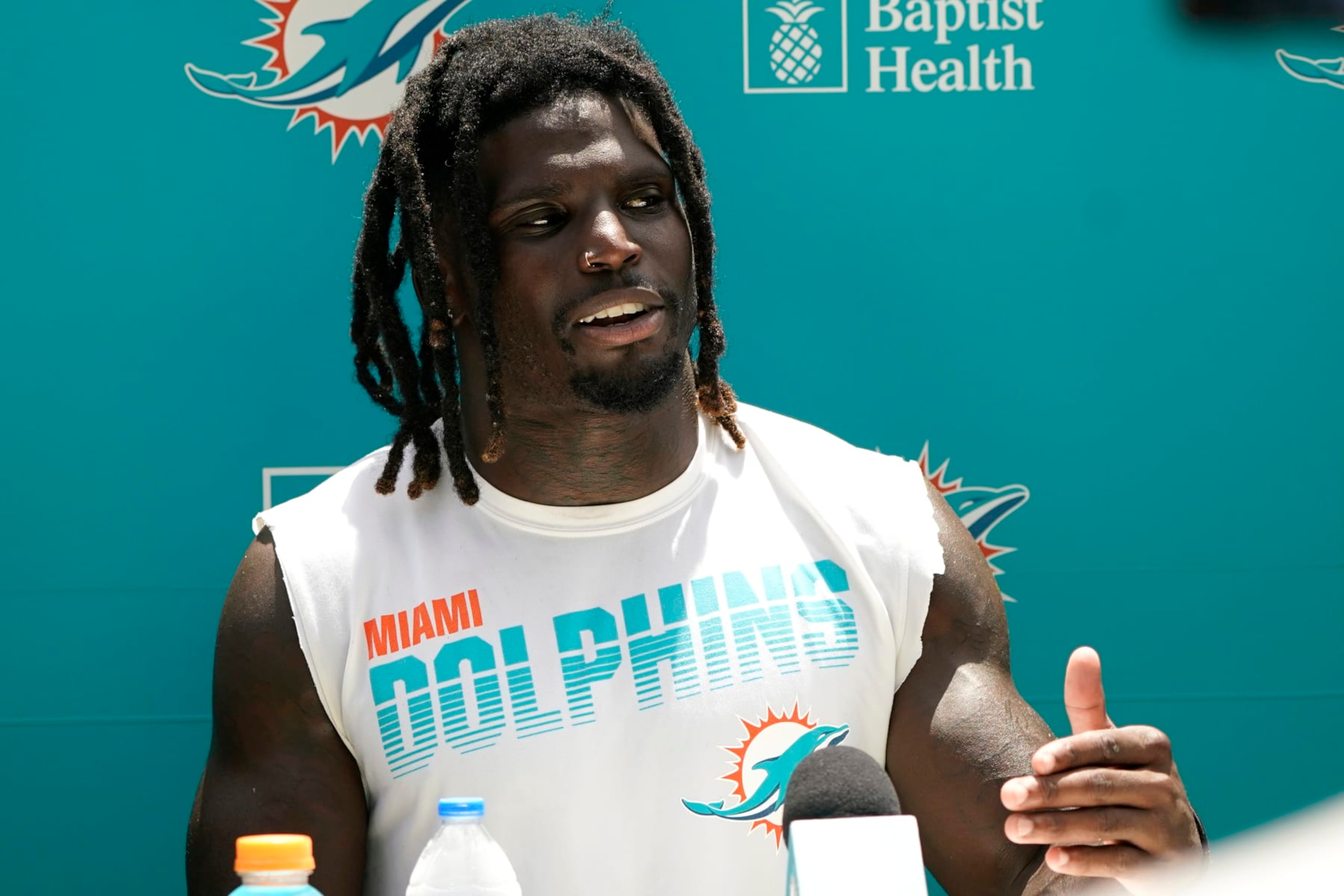 Miami Dolphins wide receiver Tyreek Hill talks with the news media at the NFL football team's practice facility, Thursday, July 28, 2022, in Miami Gardens, Fla. (AP Photo/Lynne Sladky)