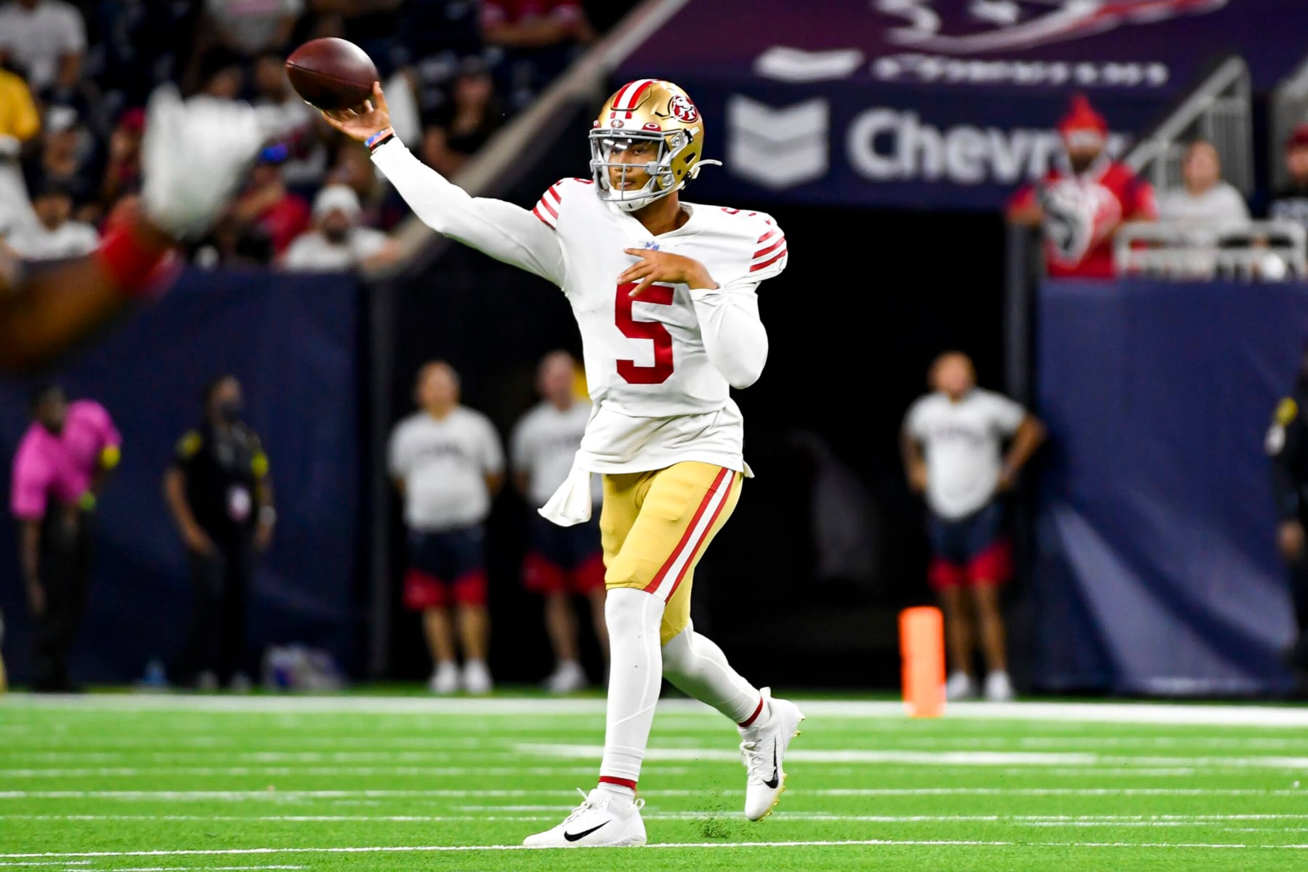 HOUSTON, TEXAS - AUGUST 25: Trey Lance #5 of the San Francisco 49ers passes the ball in the second quarter against the Houston Texans during a preseason game at NRG Stadium on August 25, 2022 in Houston, Texas. (Photo by Logan Riely/Getty Images)