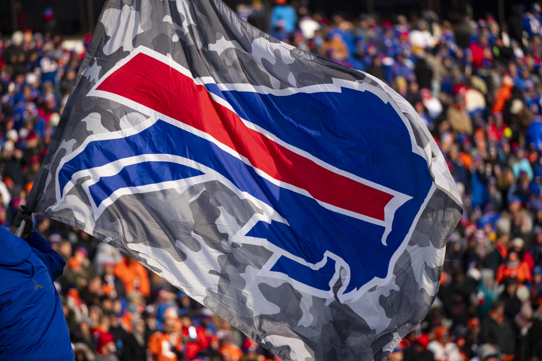 ORCHARD PARK, NY - NOVEMBER 24:  Detail view of Buffalo Bills logo on a camouflage flag waved during the second quarter against the Denver Broncos at New Era Field on November 24, 2019 in Orchard Park, New York. Buffalo defeats Denver 20-3.  (Photo by Brett Carlsen/Getty Images)