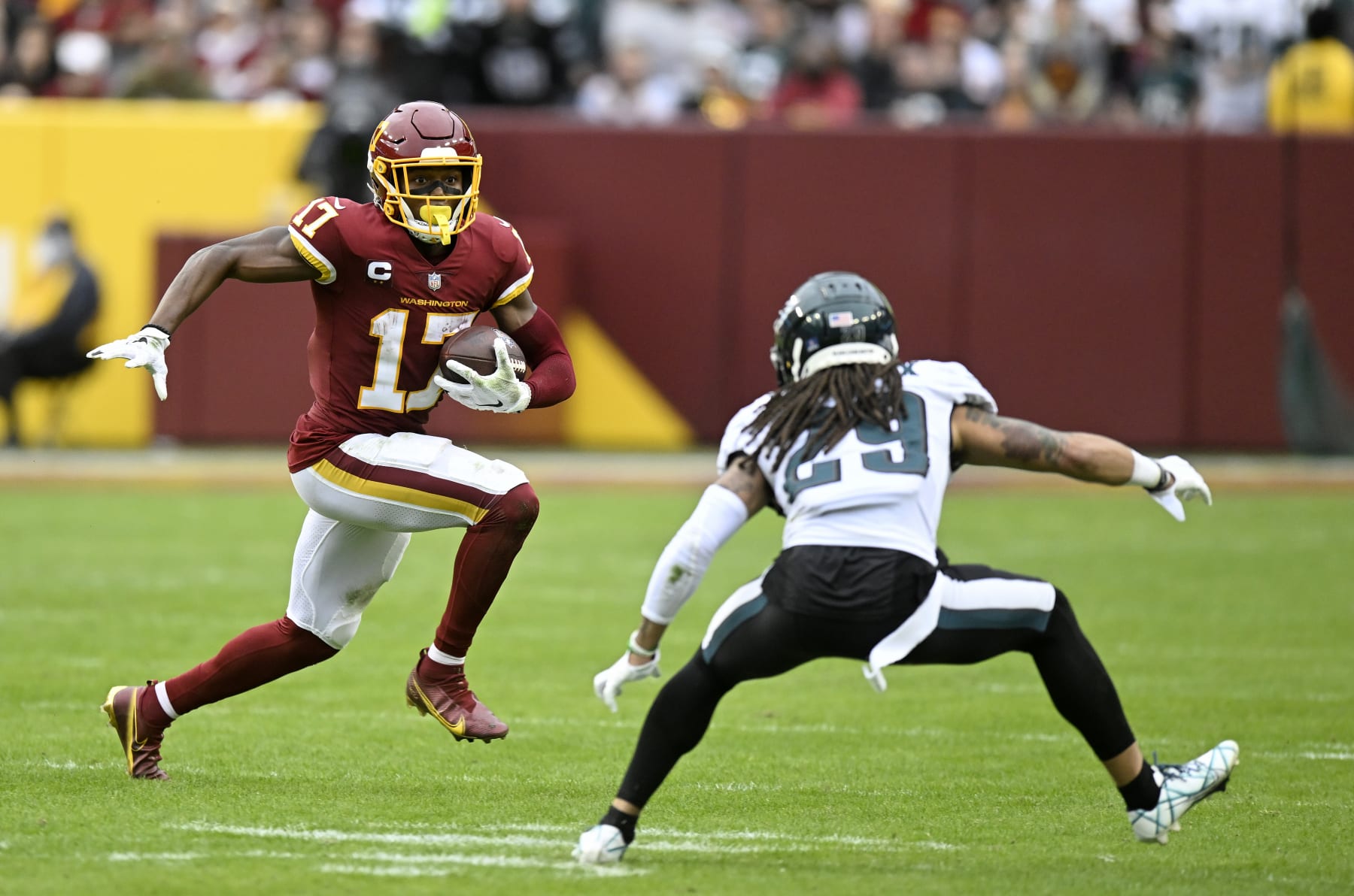 LANDOVER, MARYLAND - JANUARY 02: Terry McLaurin #17 of the Washington Football Team runs with the ball after making a catch against the Philadelphia Eagles at FedExField on January 02, 2022 in Landover, Maryland. (Photo by G Fiume/Getty Images)