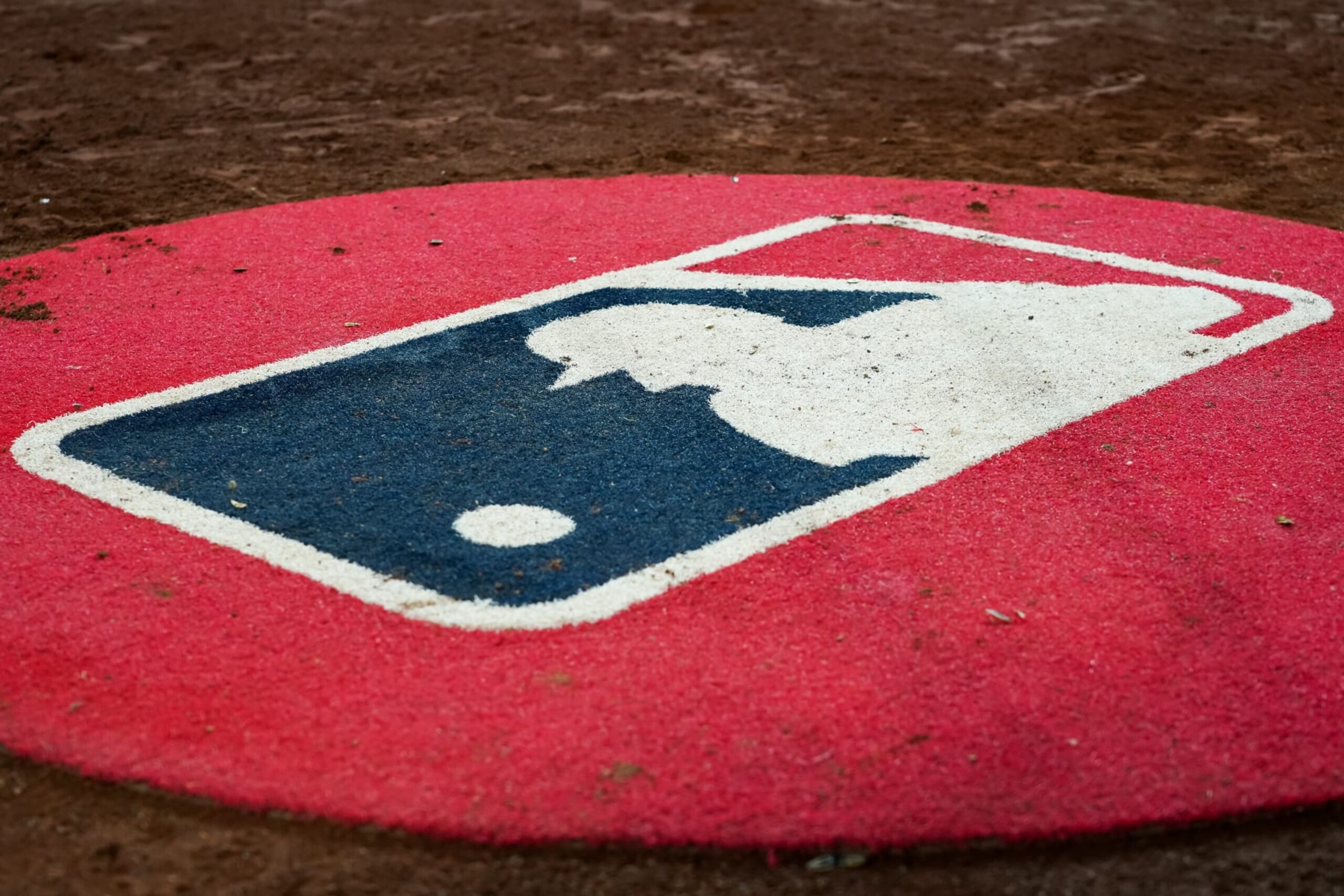 CINCINNATI, OHIO - JULY 05: A general view of the MLB logo on the on-deck circle during the game between the New York Mets and the Cincinnati Reds at Great American Ball Park on July 05, 2022 in Cincinnati, Ohio. (Photo by Dylan Buell/Getty Images)