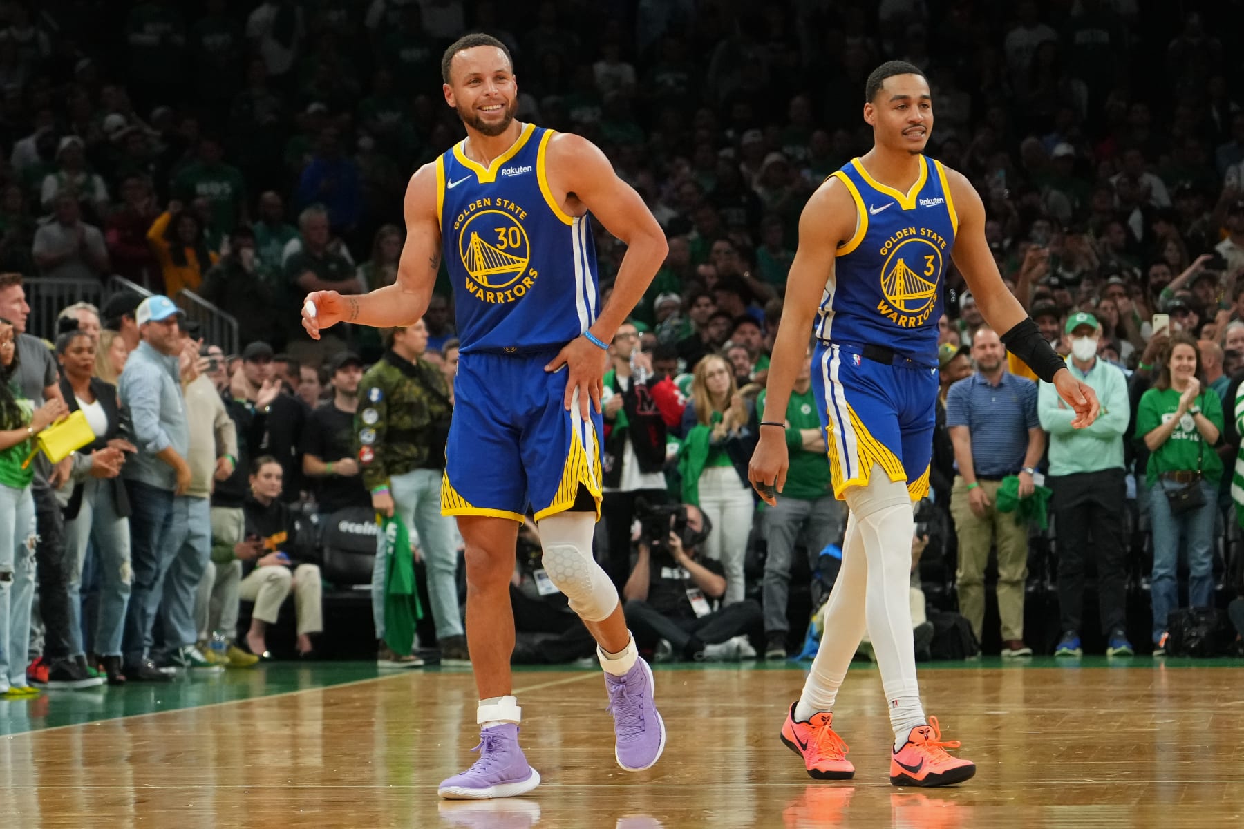 BOSTON, MA - JUNE 16: Stephen Curry #30 and Jordan Poole #3 of the Golden State Warriors look on during Game Six of the 2022 NBA Finals on June 16, 2022 at TD Garden in Boston, Massachusetts. NOTE TO USER: User expressly acknowledges and agrees that, by downloading and or using this photograph, user is consenting to the terms and conditions of Getty Images License Agreement. Mandatory Copyright Notice: Copyright 2022 NBAE (Photo by Jesse D. Garrabrant/NBAE via Getty Images)