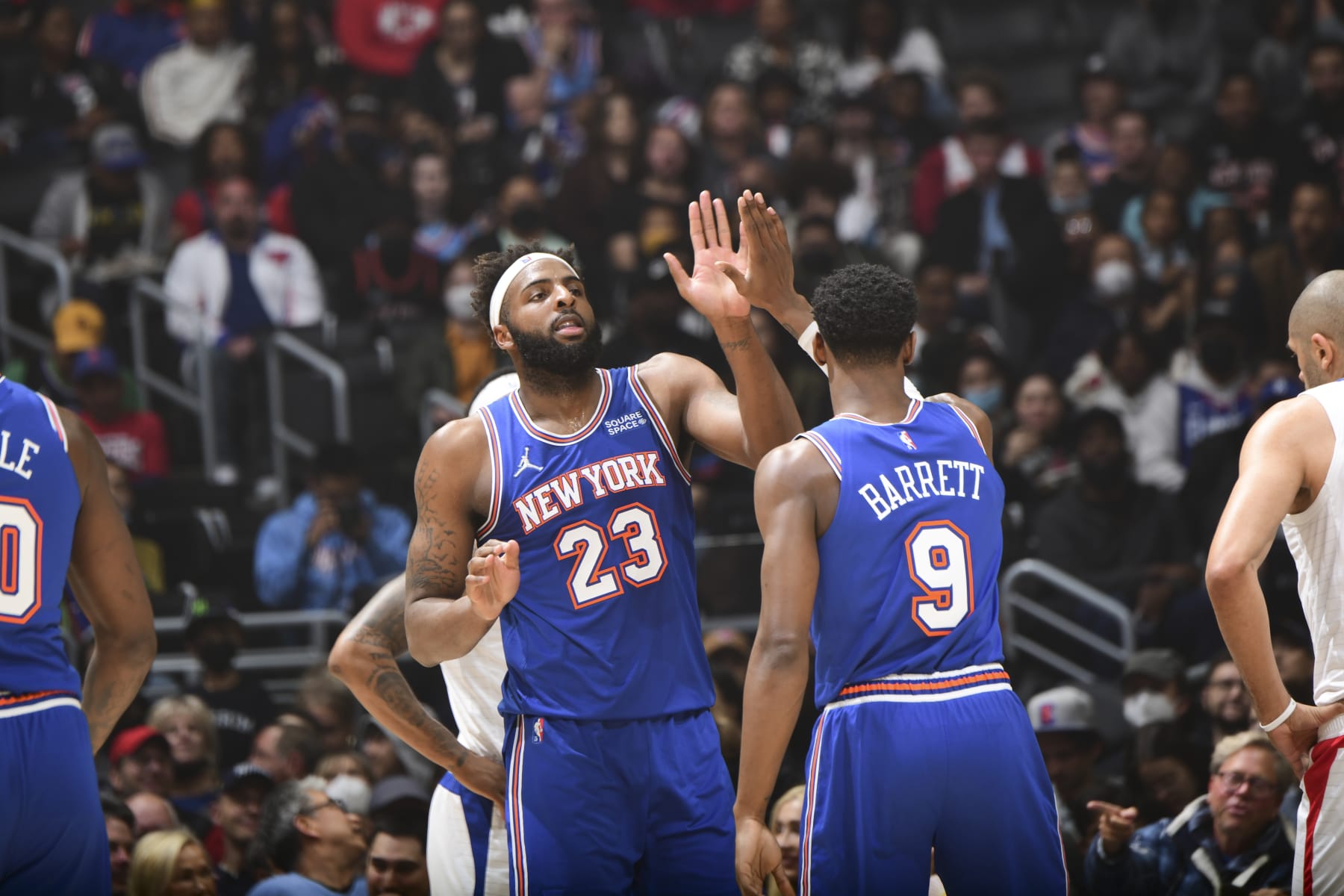 LOS ANGELES, CA - MARCH 06: Mitchell Robinson #23 of the New York Knicks high fives RJ Barrett #9 of the New York Knicks during the game against the LA Clippers on March 06, 2022 at Crypto.Com Arena in Los Angeles, California. NOTE TO USER: User expressly acknowledges and agrees that, by downloading and/or using this Photograph, user is consenting to the terms and conditions of the Getty Images License Agreement. Mandatory Copyright Notice: Copyright 2022 NBAE (Photo by Adam Pantozzi/NBAE via Getty Images)