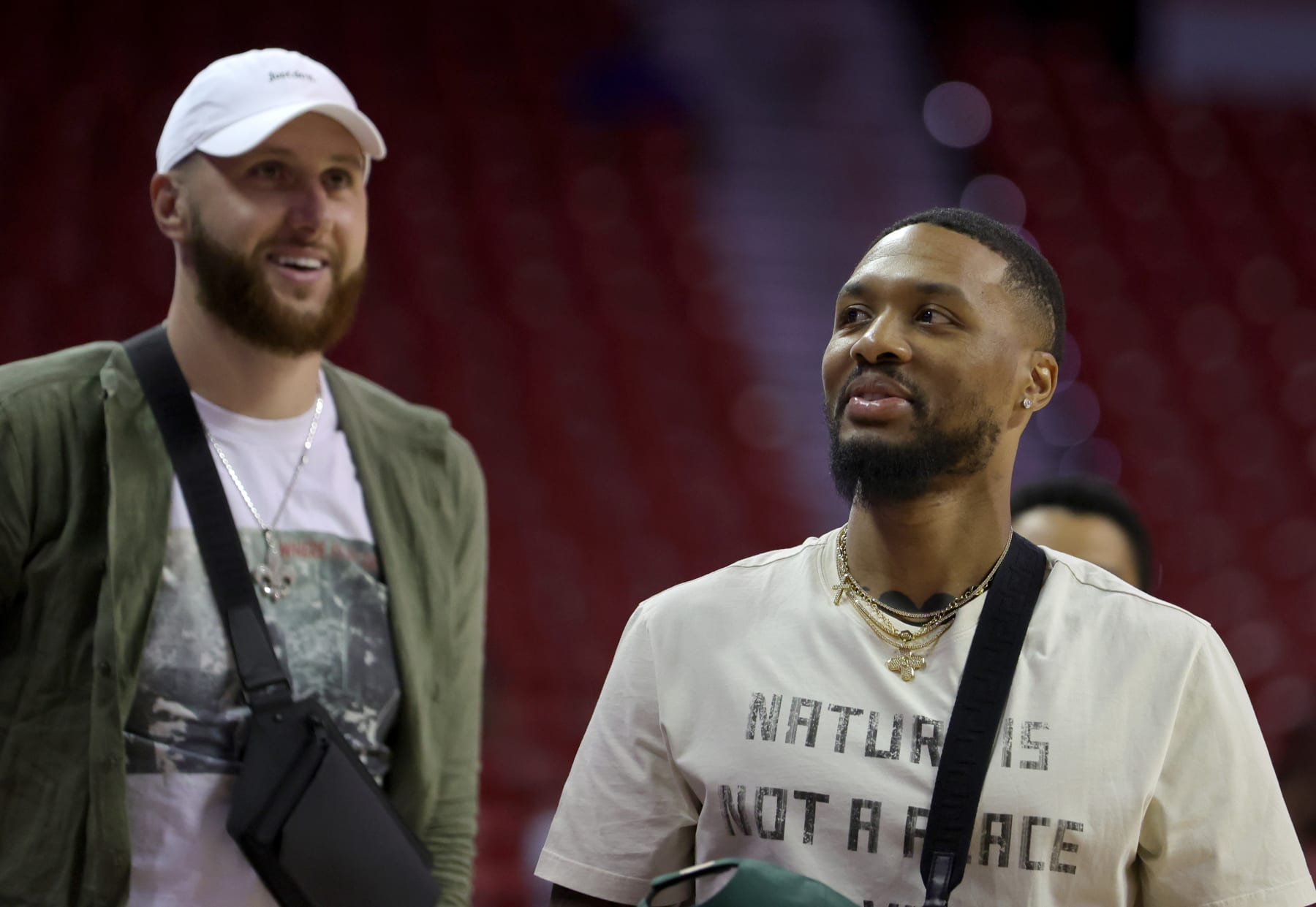 LAS VEGAS, NEVADA - JULY 07: Jusuf Nurkic (L) and Damian Lillard of the Portland Trail Blazers attend a game between the Trail Blazers and the Detroit Pistons during the 2022 NBA Summer League at the Thomas & Mack Center on July 07, 2022 in Las Vegas, Nevada. NOTE TO USER: User expressly acknowledges and agrees that, by downloading and or using this photograph, User is consenting to the terms and conditions of the Getty Images License Agreement. (Photo by Ethan Miller/Getty Images)