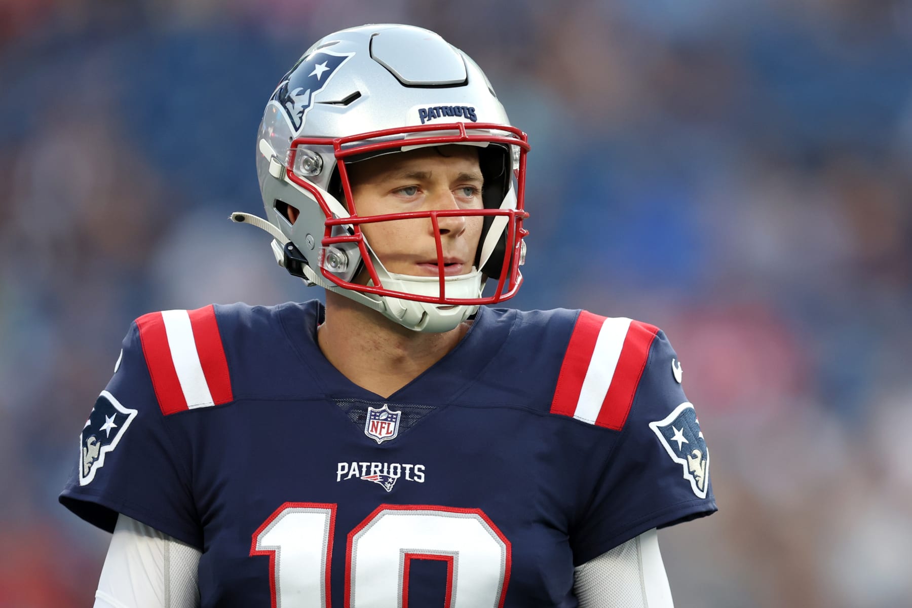 FOXBOROUGH, MASSACHUSETTS - AUGUST 19: Mac Jones #10 of the New England Patriots looks on during the preseason game between the New England Patriots and the Carolina Panthers at Gillette Stadium on August 19, 2022 in Foxborough, Massachusetts. (Photo by Maddie Meyer/Getty Images)