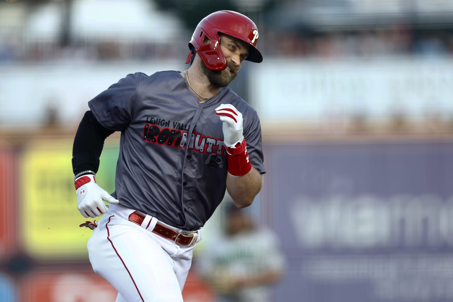 ALLENTOWN, PA - AUGUST 23: Bryce Harper #3 of the Philadelphia Phillies circles the bases after he hit a home run in his first at bat as he plays in his first game on a rehab assignment for the Lehigh Valley IronPigs against the Gwinnett Stripers at Coca-Cola Park on August 23, 2022 in Allentown, Pennsylvania. (Photo by Rich Schultz/Getty Images)