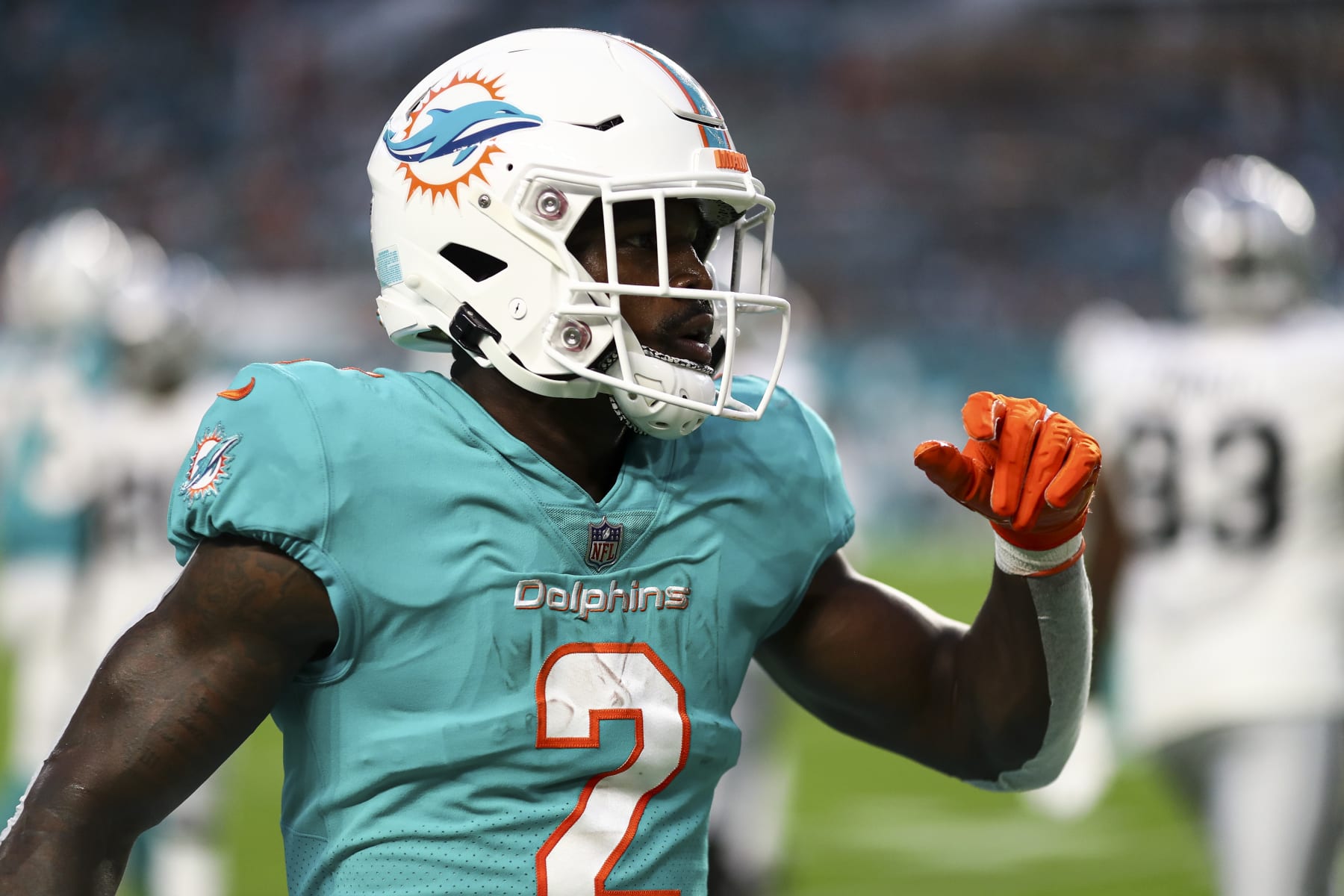 MIAMI GARDENS, FL - AUGUST 20: Chase Edmonds #2 of the Miami Dolphins celebrates after a play during a preseason NFL football game against the Las Vegas Raiders at Hard Rock Stadium on August 20, 2022 in Miami Gardens, Florida. (Photo by Kevin Sabitus/Getty Images)