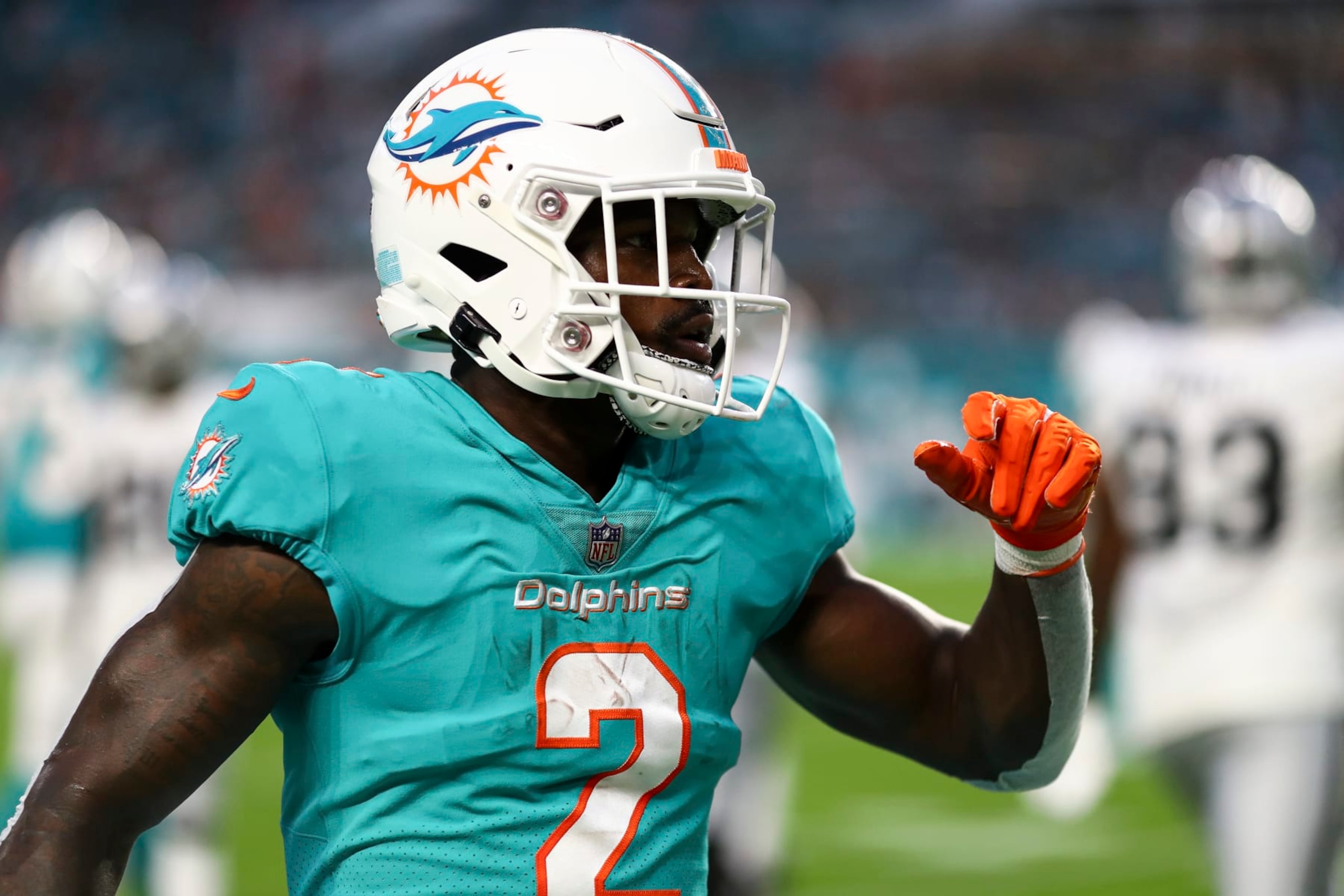 MIAMI GARDENS, FL - AUGUST 20: Chase Edmonds #2 of the Miami Dolphins celebrates after a play during a preseason NFL football game against the Las Vegas Raiders at Hard Rock Stadium on August 20, 2022 in Miami Gardens, Florida. (Photo by Kevin Sabitus/Getty Images)