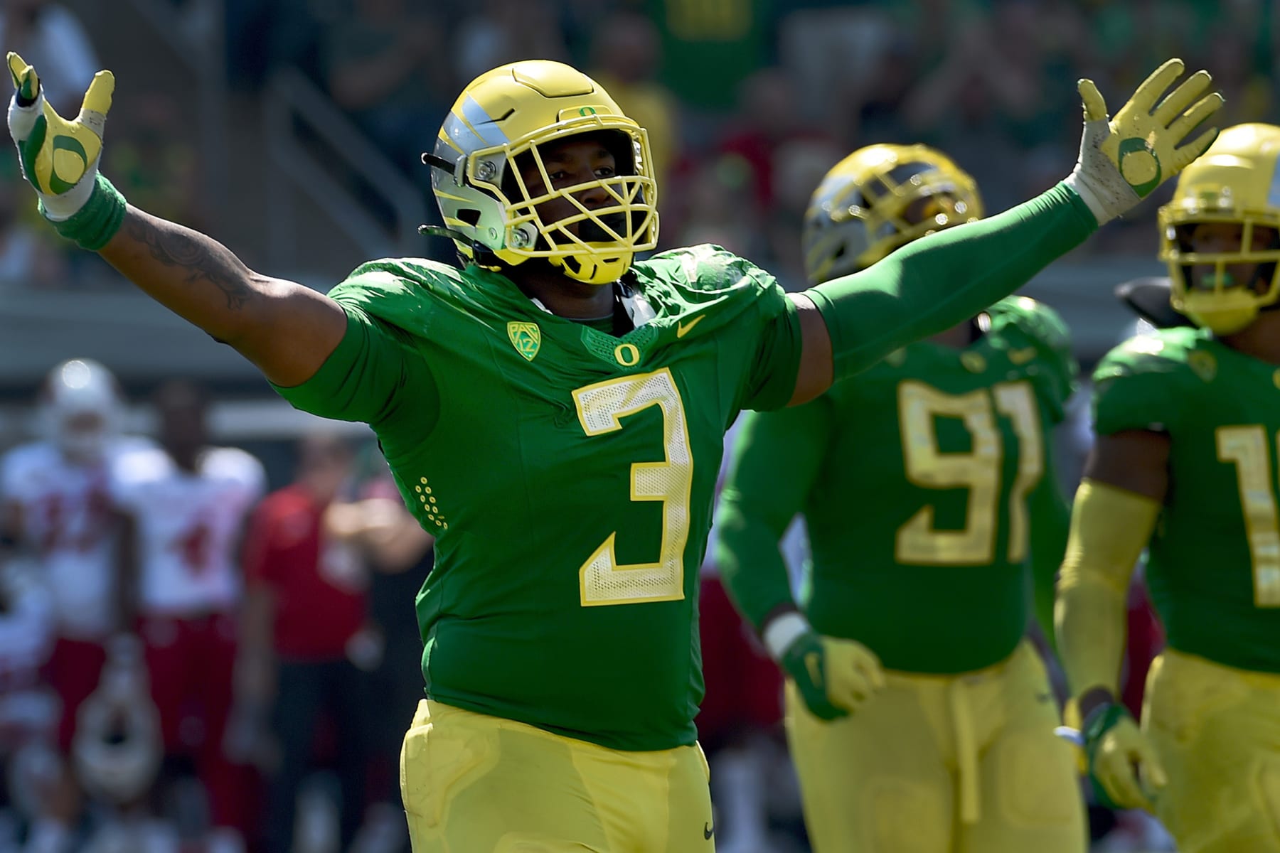 EUGENE, OREGON - SEPTEMBER 04: Defensive tackle Brandon Dorlus #3 of the Oregon Ducks reacts to a play during the fourth quarter of the game at against the Fresno State Bulldogs at Autzen Stadium on September 04, 2021 in Eugene, Oregon. Oregon won 31-24. (Photo by Steve Dykes/Getty Images)