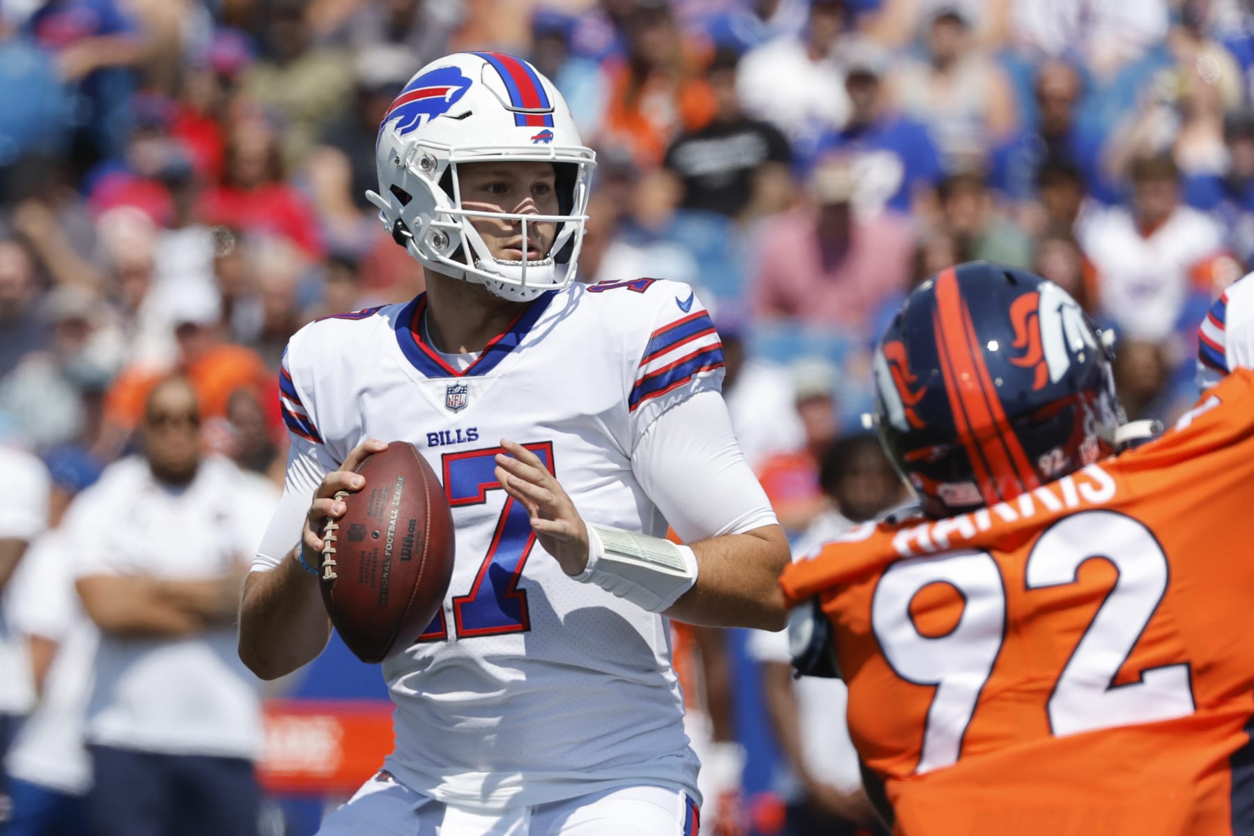 Buffalo Bills quarterback Josh Allen looks to throw during the first half of a preseason NFL football game against the Denver Broncos, Saturday, Aug. 20, 2022, in Orchard Park, N.Y. (AP Photo/Jeffrey T. Barnes)