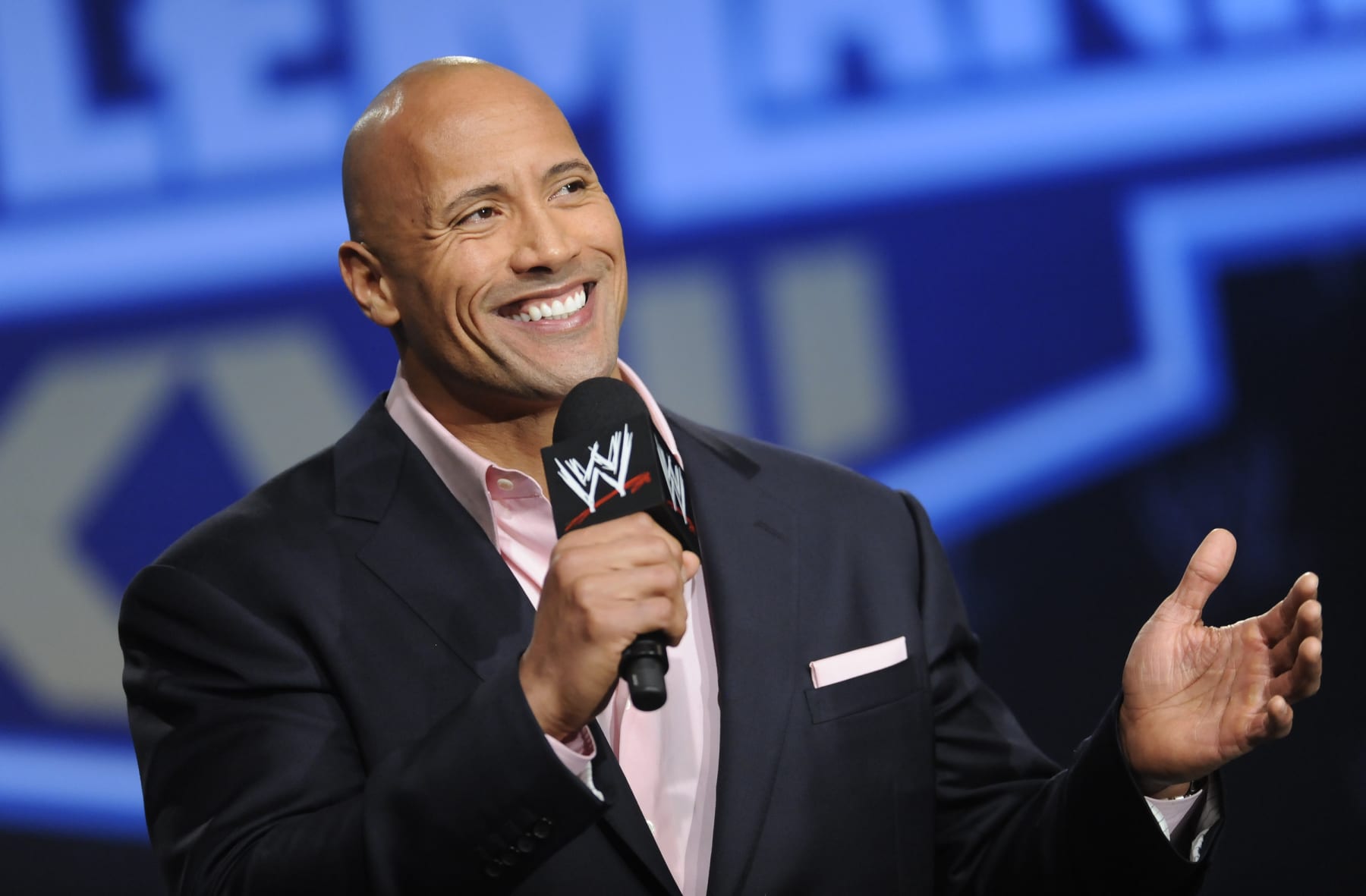 Actor and former WWE Superstar Dwayne "The Rock" Johnson participates in a Wrestlemania XXVII press conference at the Hard Rock Cafe in Times Square on Wednesday, Mar. 30, 2011 in New York. (AP Photo/Evan Agostini)