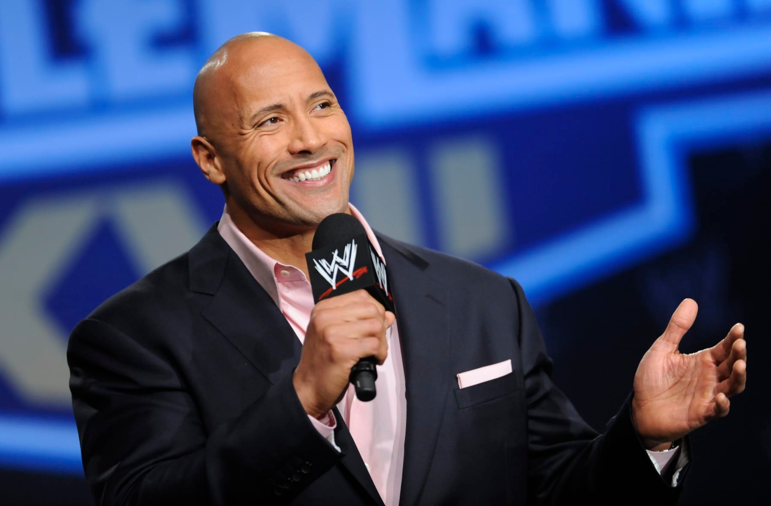 Actor and former WWE Superstar Dwayne "The Rock" Johnson participates in a Wrestlemania XXVII press conference at the Hard Rock Cafe in Times Square on Wednesday, Mar. 30, 2011 in New York. (AP Photo/Evan Agostini)