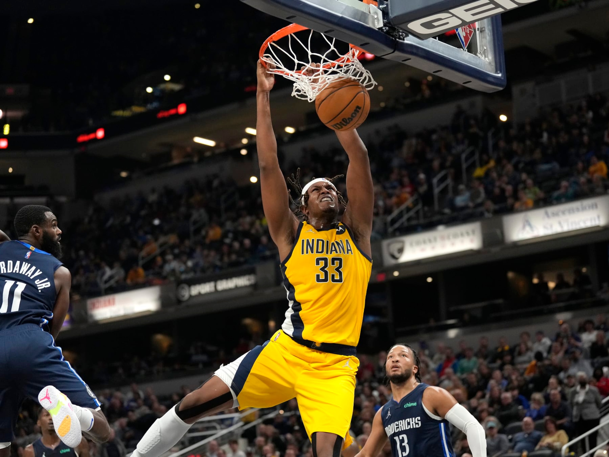 INDIANAPOLIS, IN - DECEMBER 10: (Dunk Sequence 3 of 4) Myles Turner #33 of the Indiana Pacers dunks the ball against the Dallas Mavericks on December 10, 2021 at Gainbridge Fieldhouse in Indianapolis, Indiana. NOTE TO USER: User expressly acknowledges and agrees that, by downloading and or using this Photograph, user is consenting to the terms and conditions of the Getty Images License Agreement. Mandatory Copyright Notice: Copyright 2021 NBAE (Photo by A.J. Mast/NBAE via Getty Images) INDIANAPOLIS, IN - DECEMBER 10: (Dunk Sequence 3 of 4) Myles Turner #33 of the Indiana Pacers dunks the ball against the Dallas Mavericks on December 10, 2021 at Gainbridge Fieldhouse in Indianapolis, Indiana. NOTE TO USER: User expressly acknowledges and agrees that, by downloading and or using this Photograph, user is consenting to the terms and conditions of the Getty Images License Agreement. Mandatory Copyright Notice: Copyright 2021 NBAE (Photo by A.J. Mast/NBAE via Getty Images)
