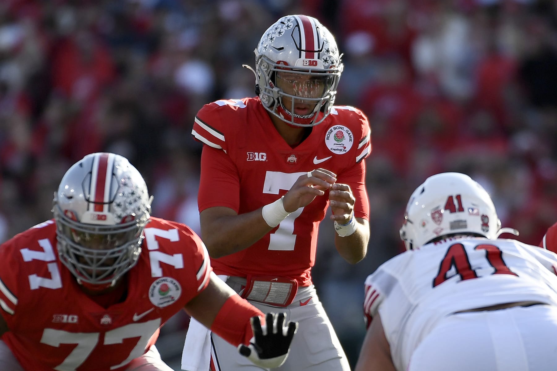 PASADENA, CALIFORNIA - JANUARY 01: C.J. Stroud #7 of the Ohio State Buckeyes looks on at the line of scrimmage against the Utah Utes during the first quarter in the Rose Bowl Game at Rose Bowl Stadium on January 01, 2022 in Pasadena, California. (Photo by Kevork Djansezian/Getty Images)