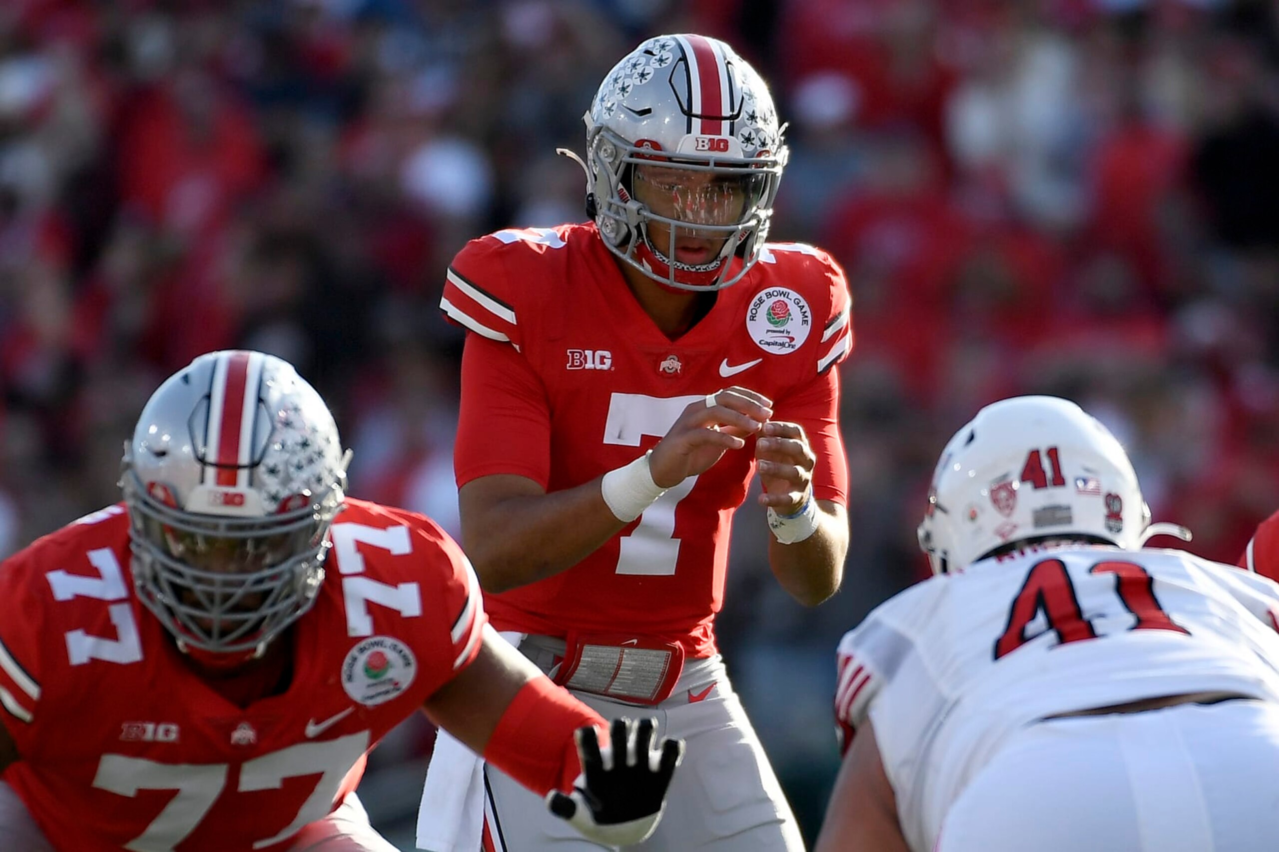 PASADENA, CALIFORNIA - JANUARY 01: C.J. Stroud #7 of the Ohio State Buckeyes looks on at the line of scrimmage against the Utah Utes during the first quarter in the Rose Bowl Game at Rose Bowl Stadium on January 01, 2022 in Pasadena, California. (Photo by Kevork Djansezian/Getty Images)