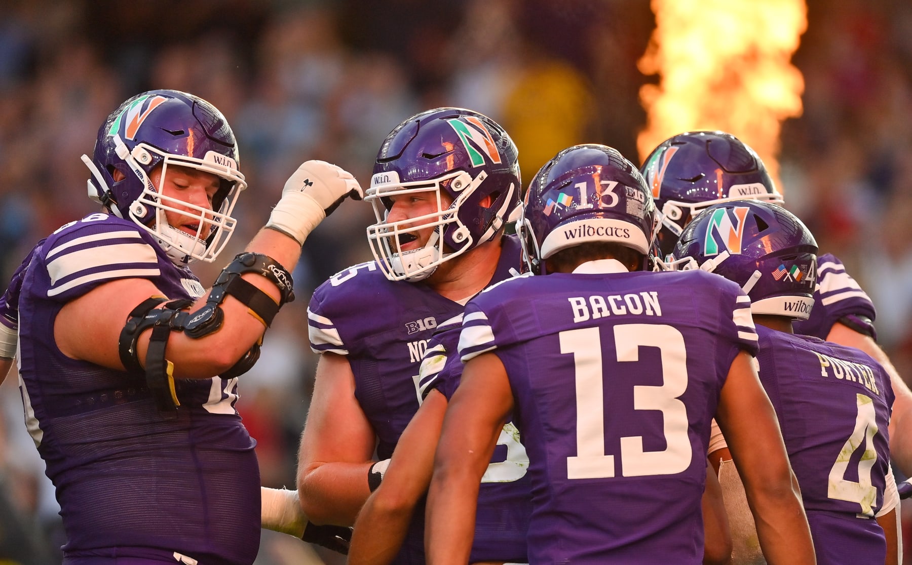 Dublin , Ireland - 27 August 2022; Northwestern Wildcats players celebrate a touchdown by teammate Donny Navarro III during the Aer Lingus College Football Classic 2022 match between Northwestern Wildcats and Nebraska Cornhuskers at Aviva Stadium in Dublin. (Photo By Brendan Moran/Sportsfile via Getty Images)