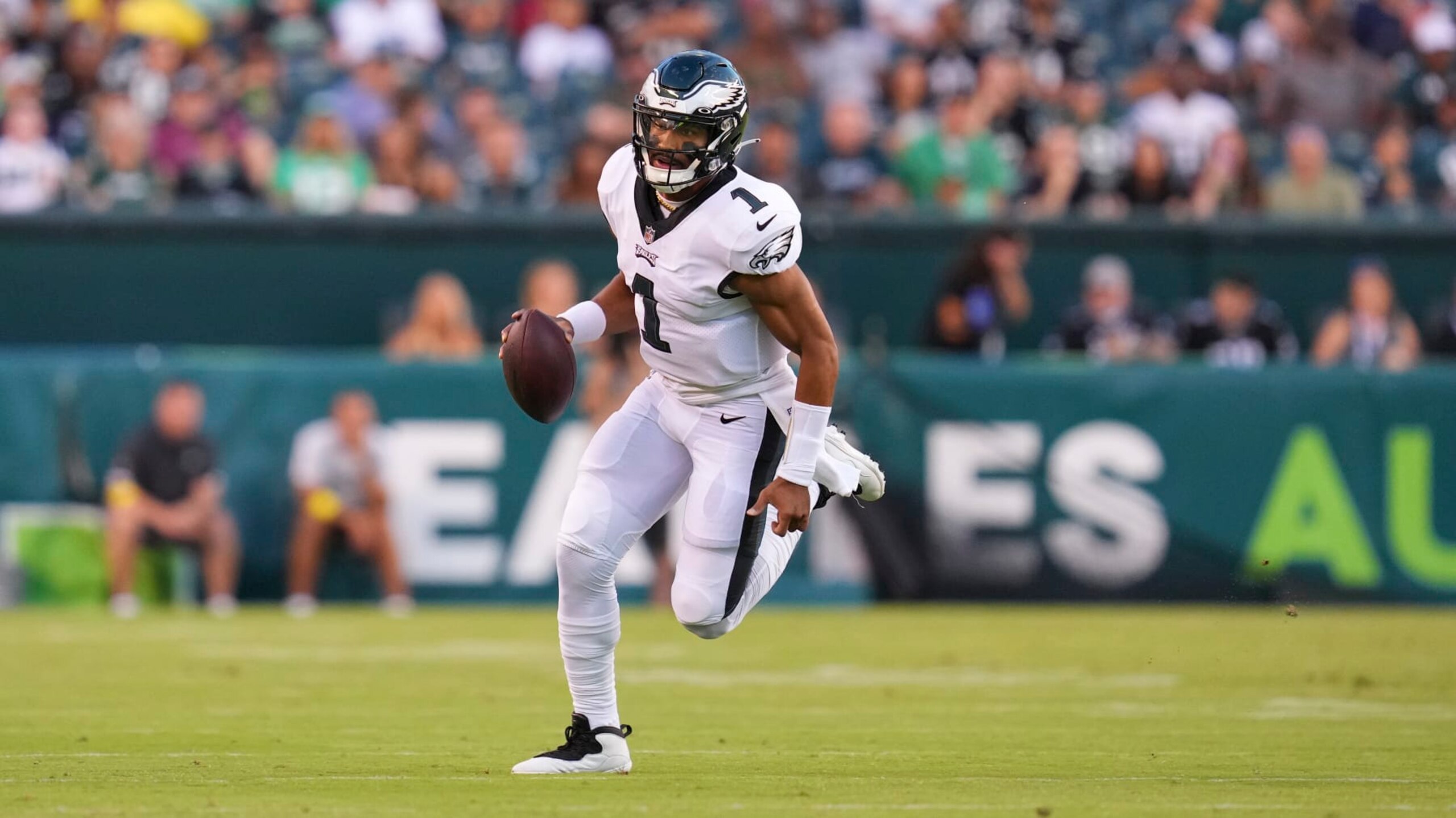 PHILADELPHIA, PA - AUGUST 12: Jalen Hurts #1 of the Philadelphia Eagles scrambles against the New York Jets during the preseason game at Lincoln Financial Field on August 12, 2022 in Philadelphia, Pennsylvania. The Jets defeated the Eagles 24-21. (Photo by Mitchell Leff/Getty Images)