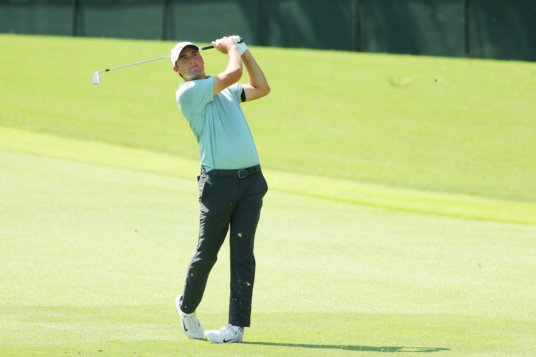 ATLANTA, GEORGIA - AUGUST 27: Scottie Scheffler of the United States plays a shot on the first hole during the third round of the TOUR Championship at East Lake Golf Club on August 27, 2022 in Atlanta, Georgia. (Photo by Kevin C. Cox/Getty Images)