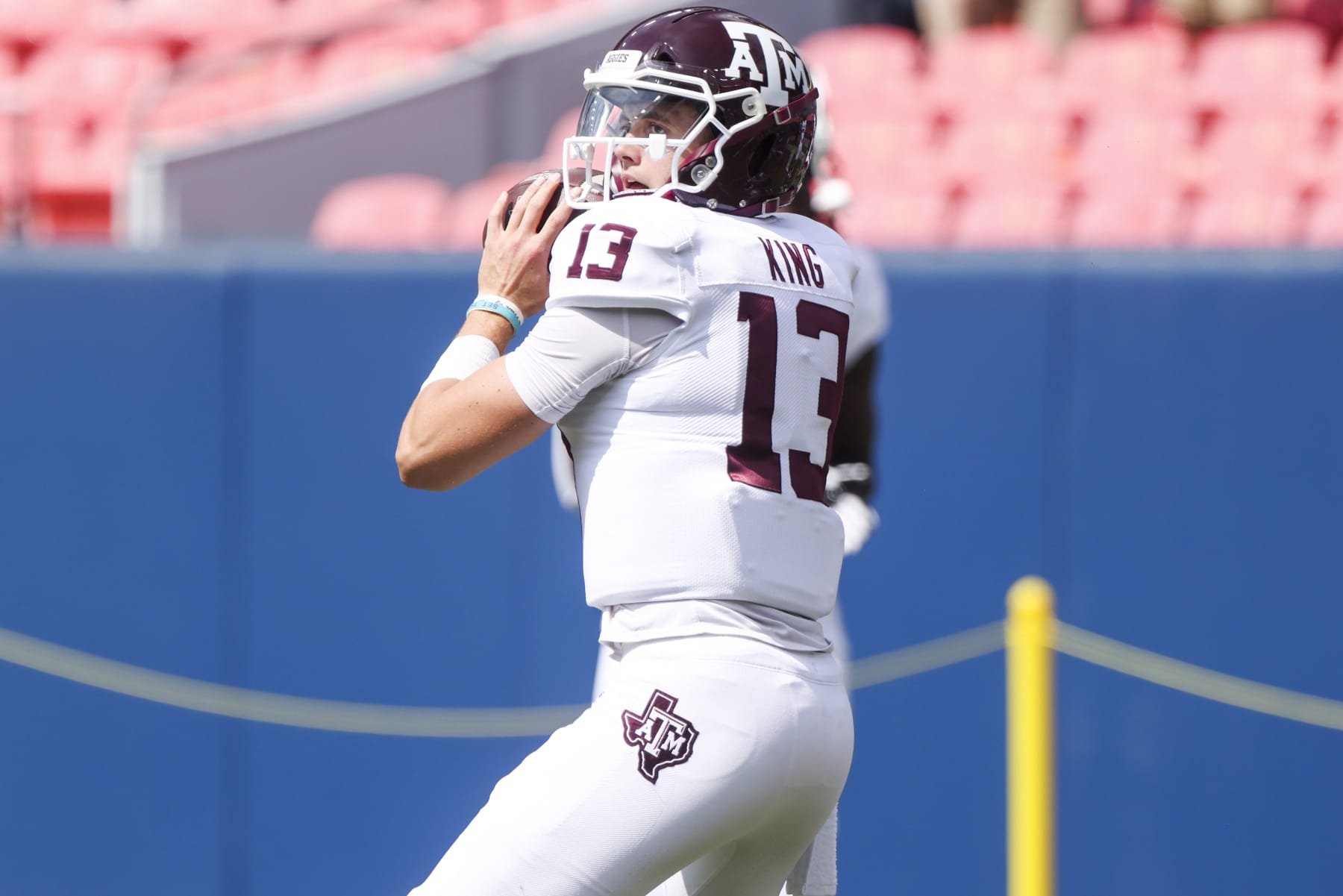 DENVER, CO - SEPTEMBER 11: Haynes King #13 of the Texas A&M Aggies warms up before playing the Colorado Buffaloes at Empower Field At Mile High on September 11, 2021 in Denver, Colorado. (Photo by Michael Ciaglo/Getty Images)