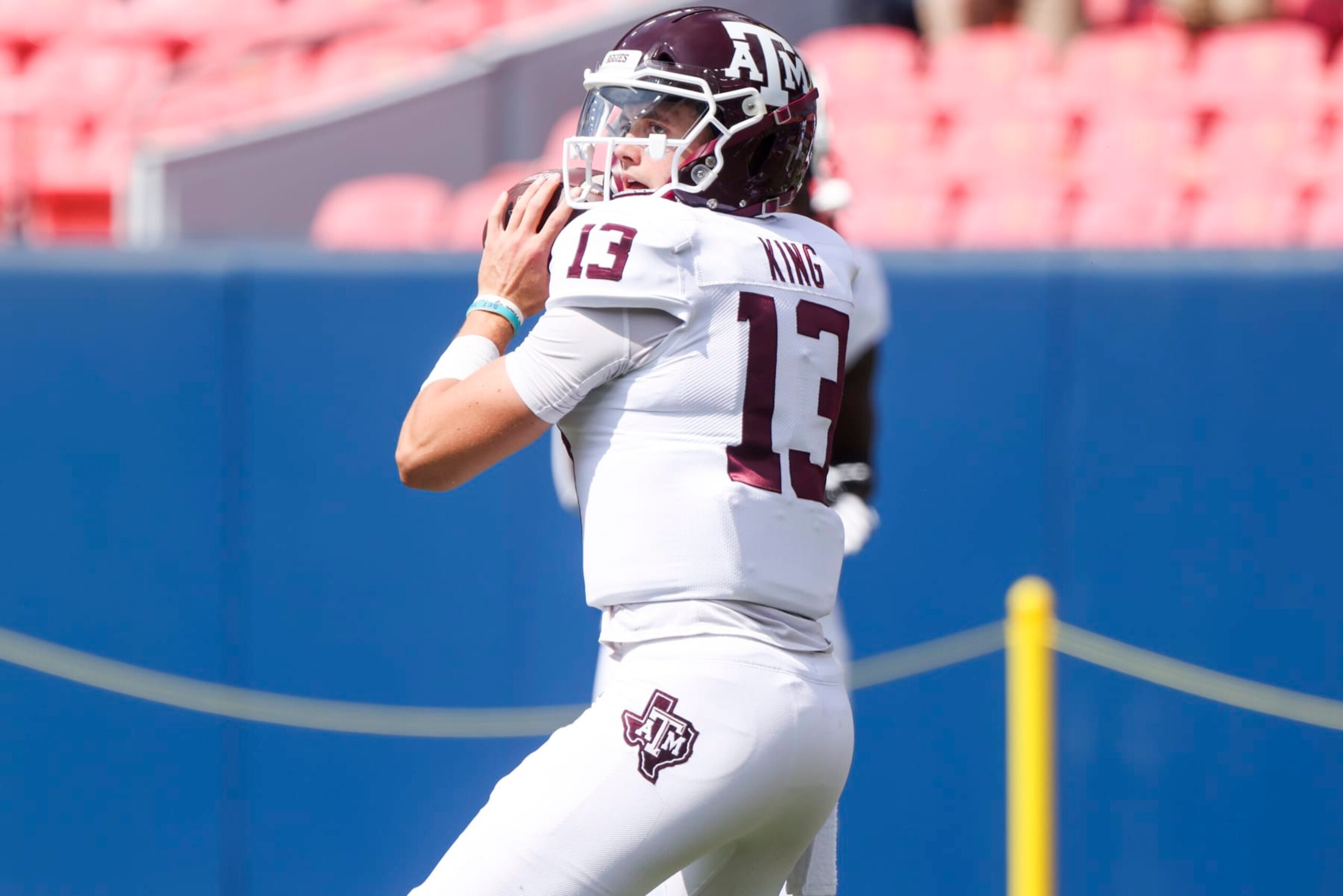 DENVER, CO - SEPTEMBER 11: Haynes King #13 of the Texas A&M Aggies warms up before playing the Colorado Buffaloes at Empower Field At Mile High on September 11, 2021 in Denver, Colorado. (Photo by Michael Ciaglo/Getty Images)