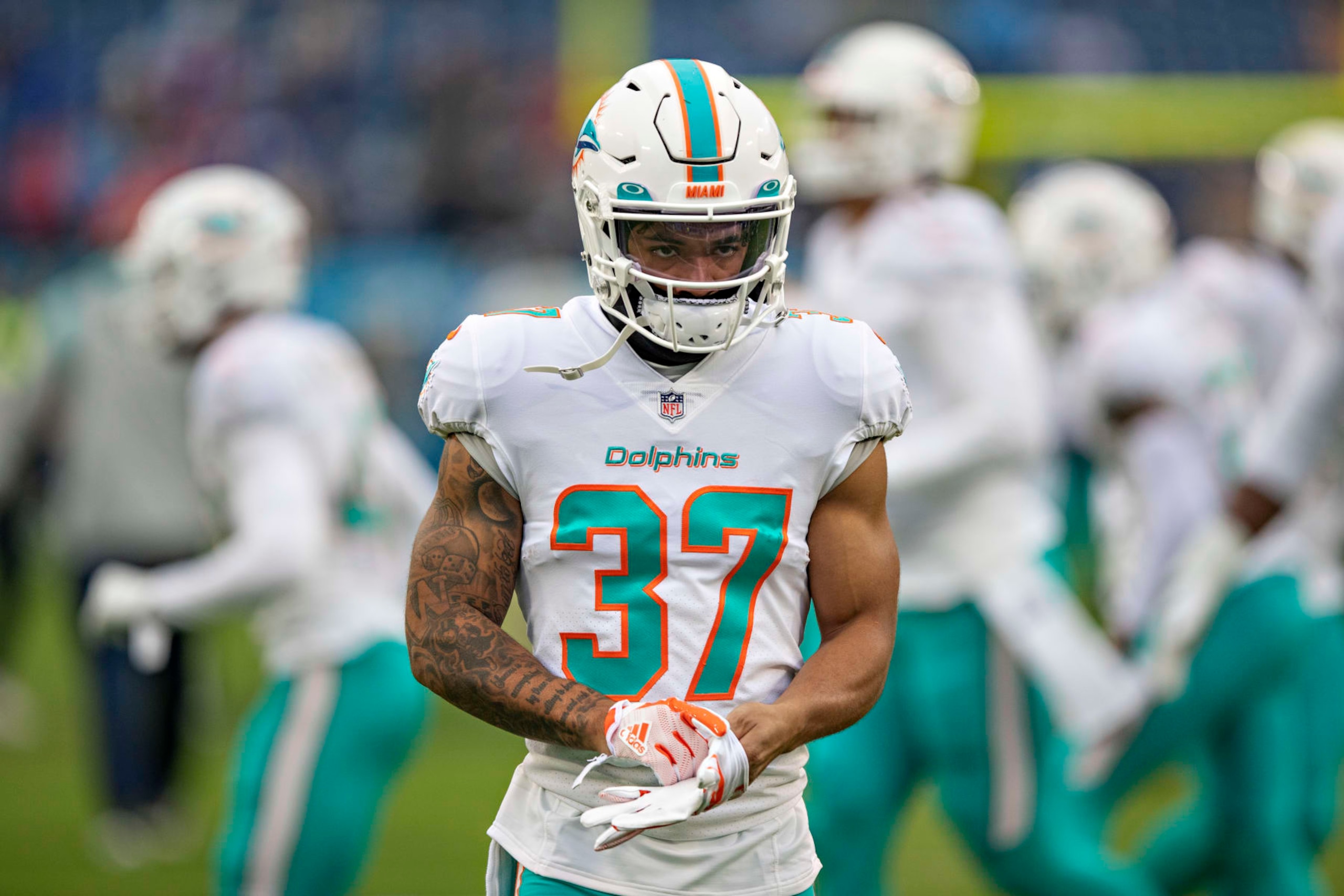 NASHVILLE, TENNESSEE - JANUARY 2:  Myles Gaskin #37 of the Miami Dolphins warms up before a game against the Tennessee Titans at Nissan Stadium on January 2, 2022 in Nashville, Tennessee.  The Titans defeated the Dolphins 34-3.  (Photo by Wesley Hitt/Getty Images)