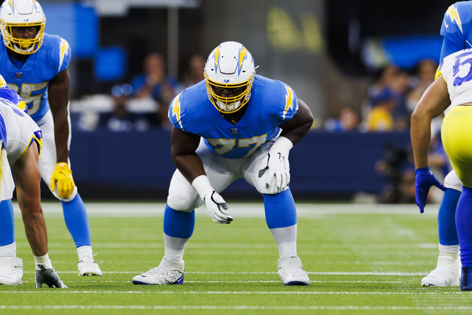 INGLEWOOD, CA - AUGUST 13: Los Angeles Chargers guard Zion Johnson (77) in an offensive stance during the NFL preseason football game against the Los Angeles Rams on August 13, 2022, at SoFi Stadium in Inglewood, CA. (Photo by Ric Tapia/Icon Sportswire via Getty Images)