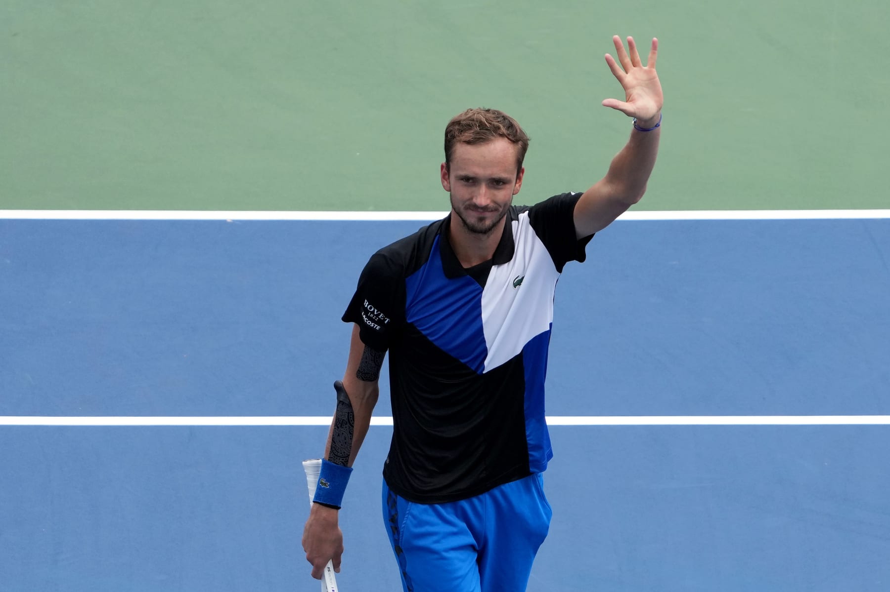 MASON, OHIO - AUGUST 19: Daniil Medvedev of Russia celebrates after defeating Taylor Fritz of the United States in their Men's Singles Quarterfinal match on day seven of the Western & Southern Open at Lindner Family Tennis Center on August 19, 2022 in Mason, Ohio. Medvedev defeated Fritz with a score of 7-6, 6-3. (Photo by Dylan Buell/Getty Images)