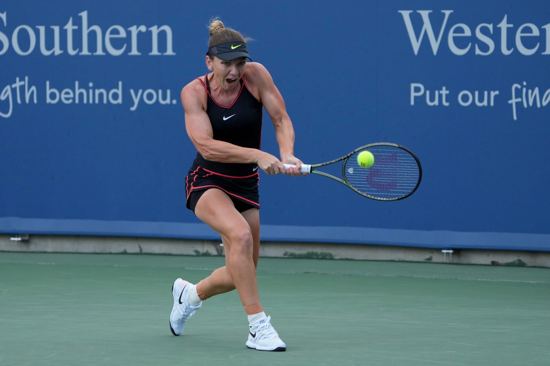 MASON, OHIO - AUGUST 16: Simona Halep of Romania plays a backhand during her match against Anastasia Potapova of Russia during the Western & Southern Open at the Lindner Family Tennis Center on August 16, 2022 in Mason, Ohio. (Photo by Dylan Buell/Getty Images)