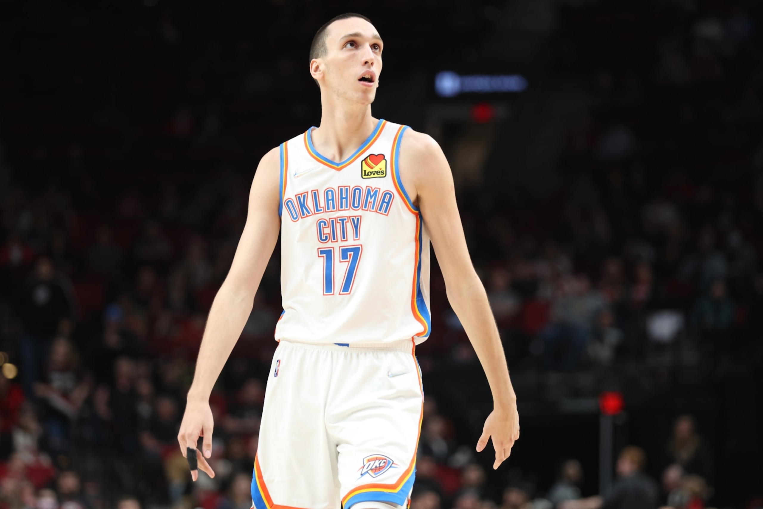 PORTLAND, OREGON - MARCH 28: Aleksej Pokusevski #17 of the Oklahoma City Thunder reacts against the Portland Trail Blazers during the third quarter at Moda Center on March 28, 2022 in Portland, Oregon. NOTE TO USER: User expressly acknowledges and agrees that, by downloading and or using this photograph, User is consenting to the terms and conditions of the Getty Images License Agreement. (Photo by Abbie Parr/Getty Images) PORTLAND, OREGON - MARCH 28: Aleksej Pokusevski #17 of the Oklahoma City Thunder reacts against the Portland Trail Blazers during the third quarter at Moda Center on March 28, 2022 in Portland, Oregon. NOTE TO USER: User expressly acknowledges and agrees that, by downloading and or using this photograph, User is consenting to the terms and conditions of the Getty Images License Agreement. (Photo by Abbie Parr/Getty Images)