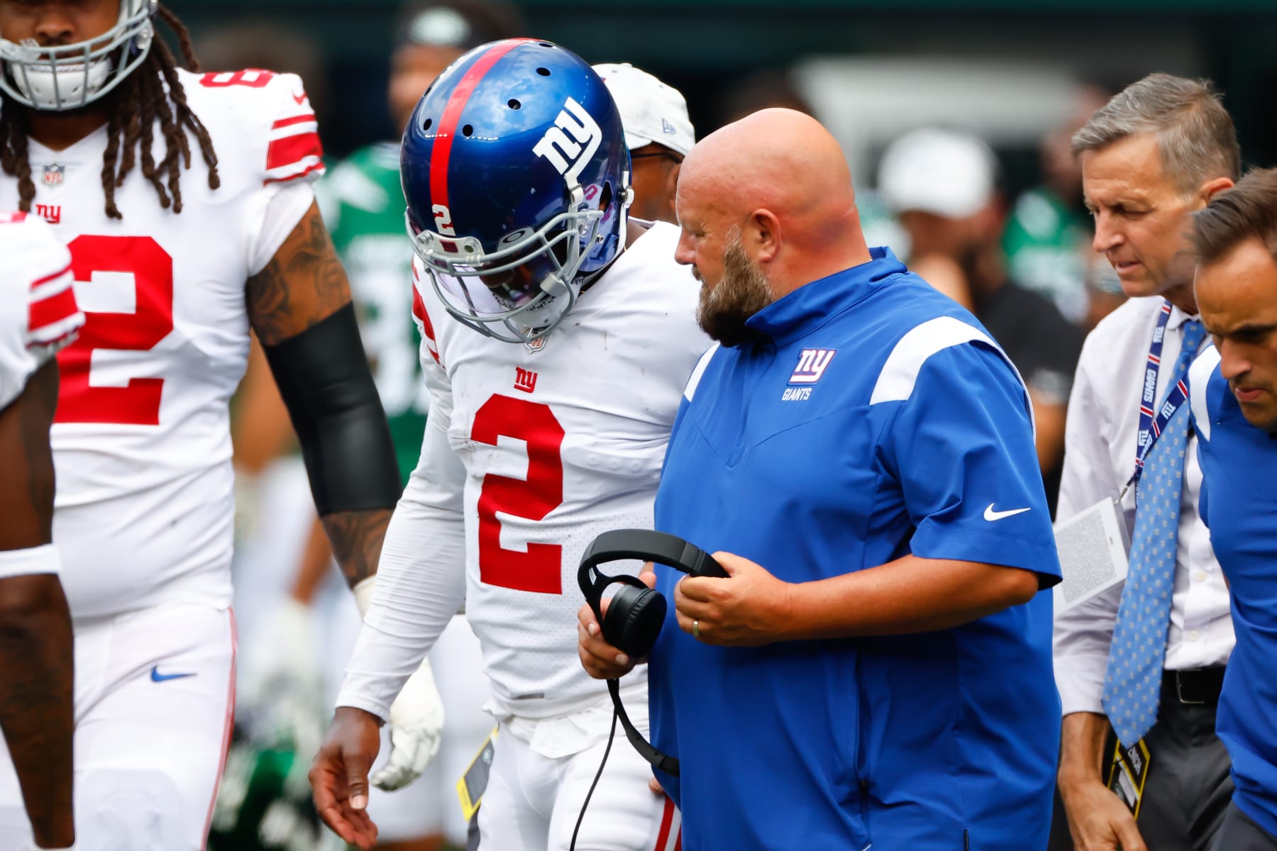 EAST RUTHERFORD, NJ - AUGUST 28:  New York Giants quarterback Tyrod Taylor (2) and head coach Brian Daboll leave the field during the first quarter of the National Football League game between the New York Jets and the New York Giants on August 28, 2022 at MetLife Stadium in East Rutherford, New Jersey.   (Photo by Rich Graessle/Icon Sportswire via Getty Images)