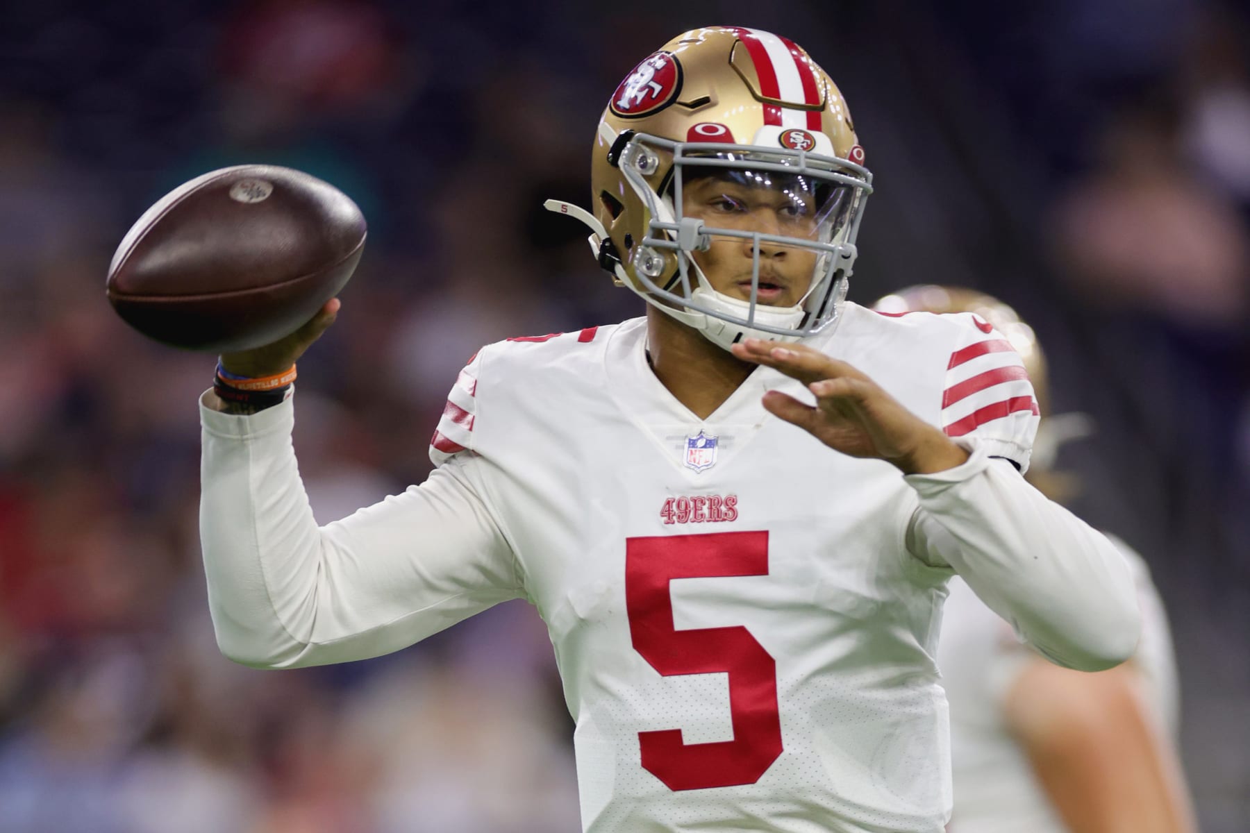 HOUSTON, TEXAS - AUGUST 25: Trey Lance #5 of the San Francisco 49ers looks to pass during the first quarter of a preseason game against the Houston Texans at NRG Stadium on August 25, 2022 in Houston, Texas. (Photo by Carmen Mandato/Getty Images)